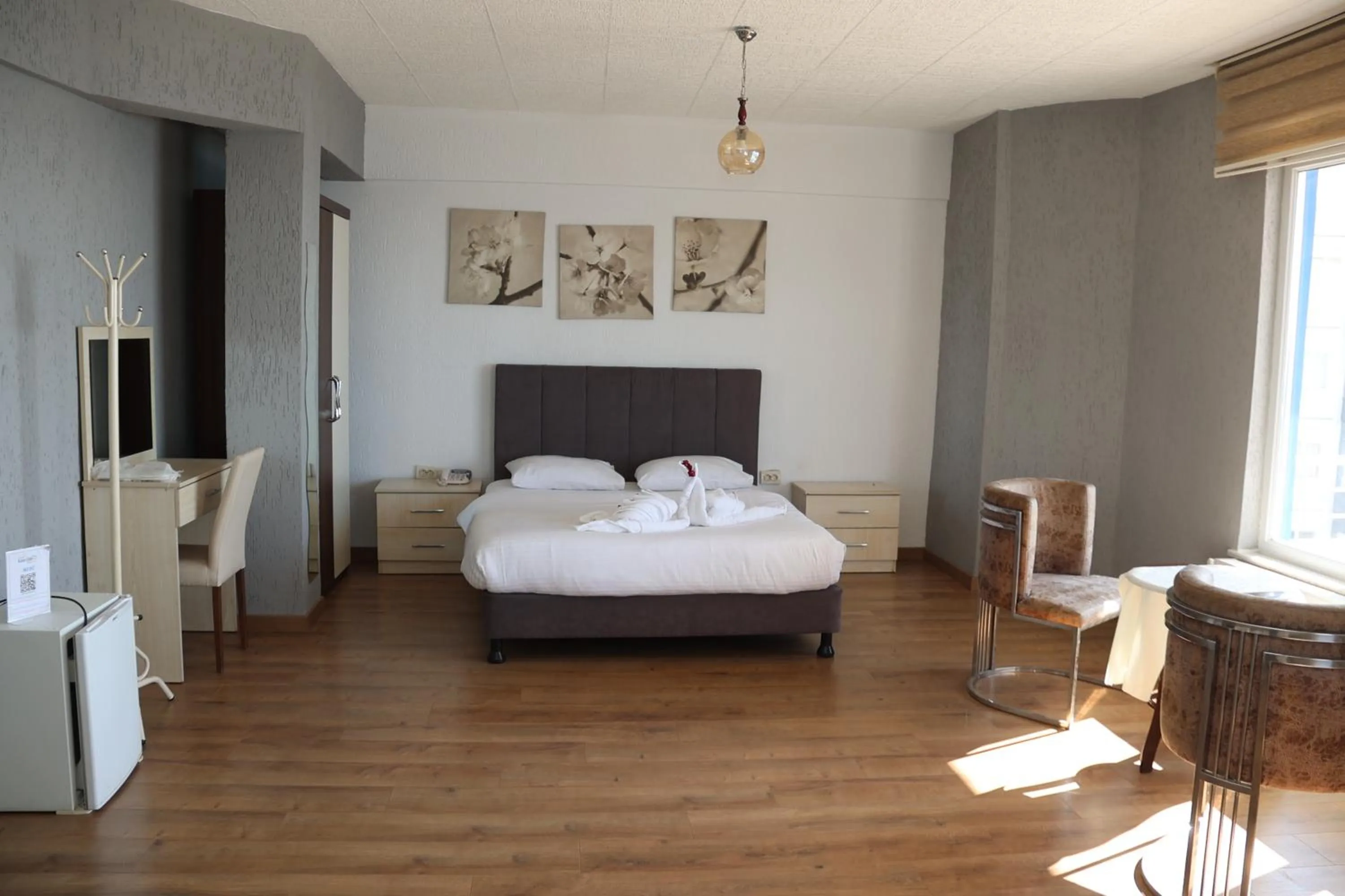 Bed in Grand Koru Hotel Beach