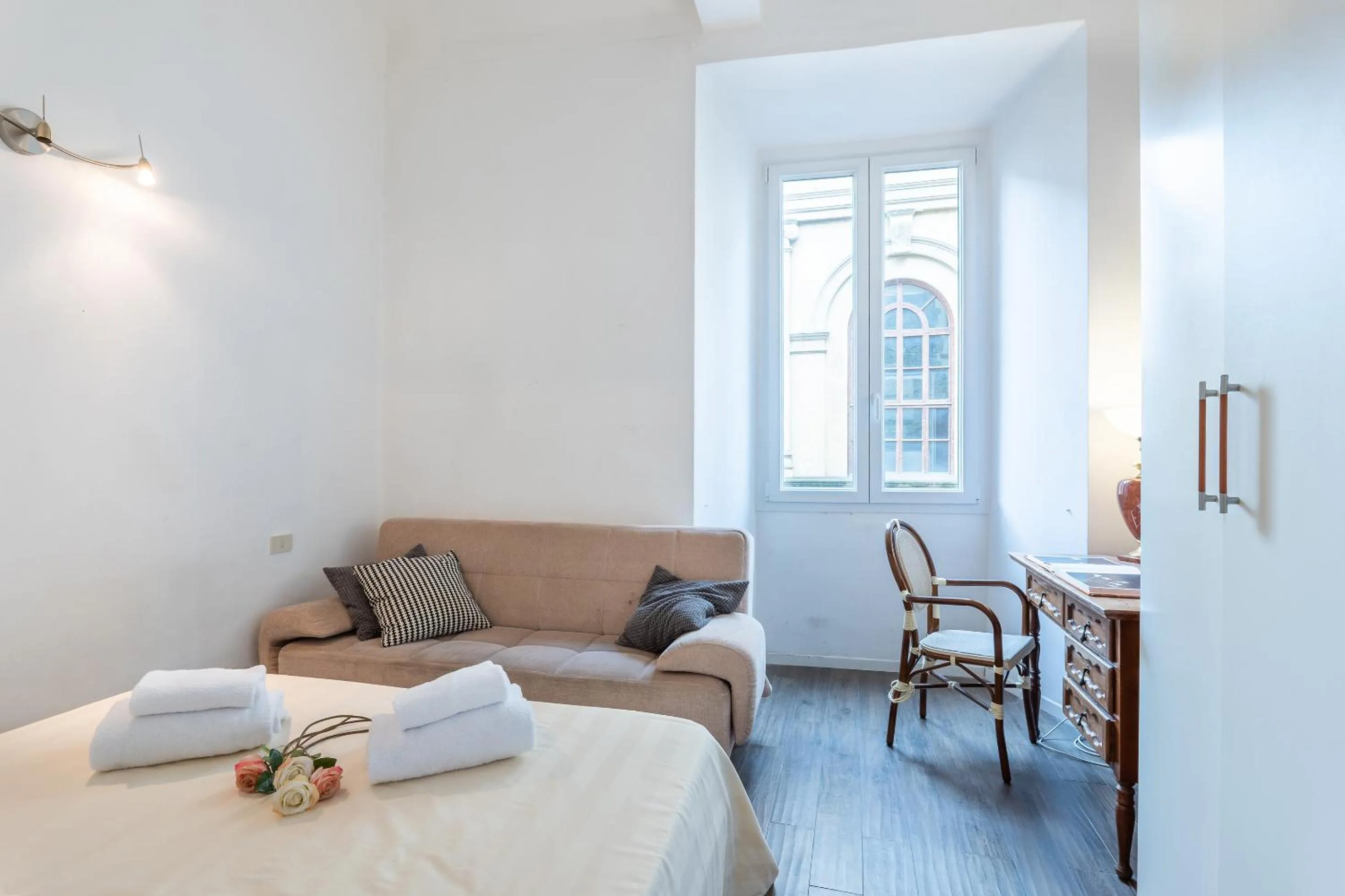 Bed in Palazzo Vecchio Apartments by Mmega