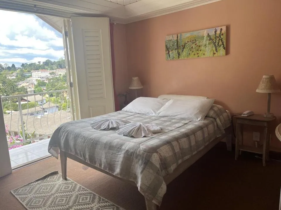 Bed in Pousada Vila das Cores