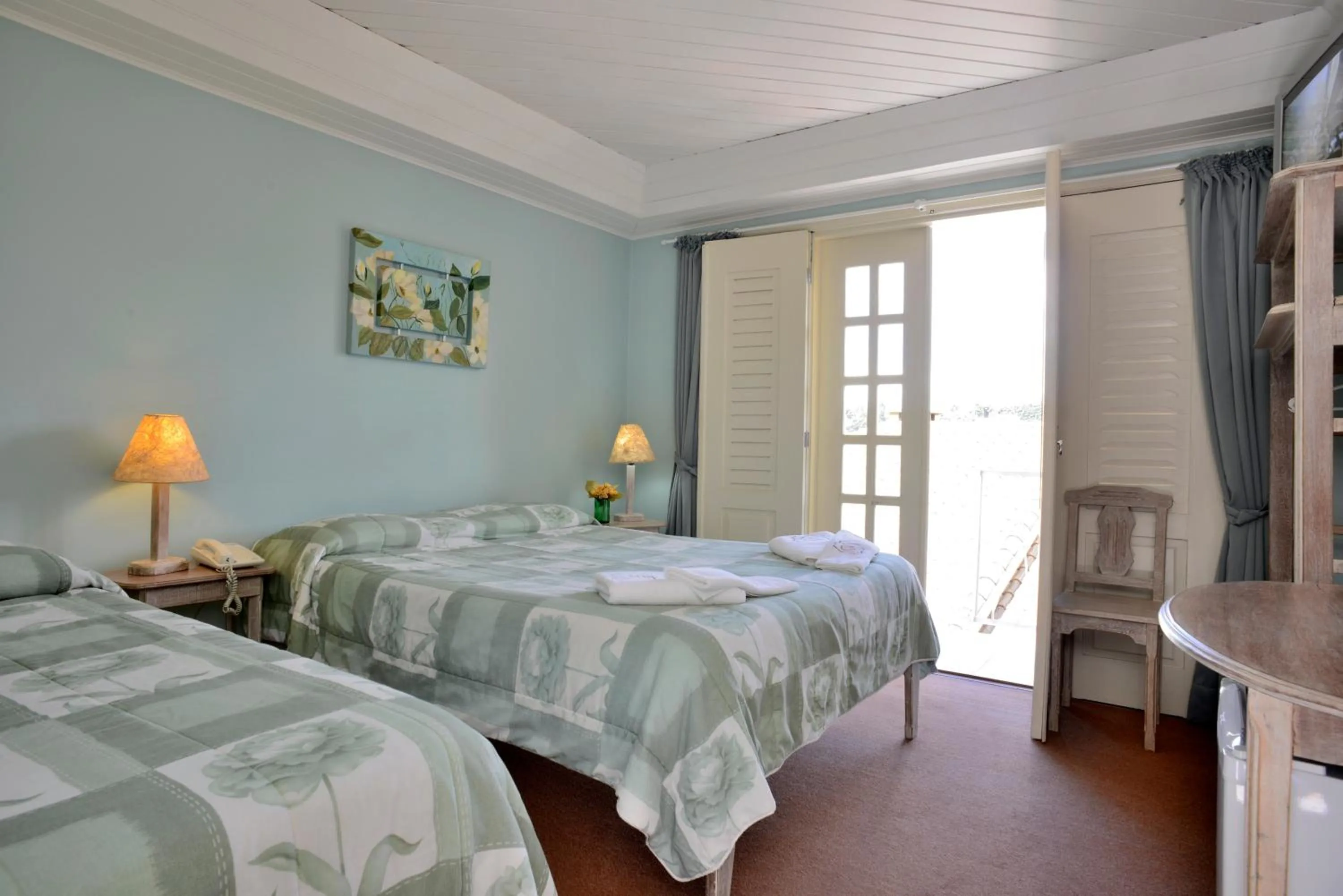 Bed in Pousada Vila das Cores