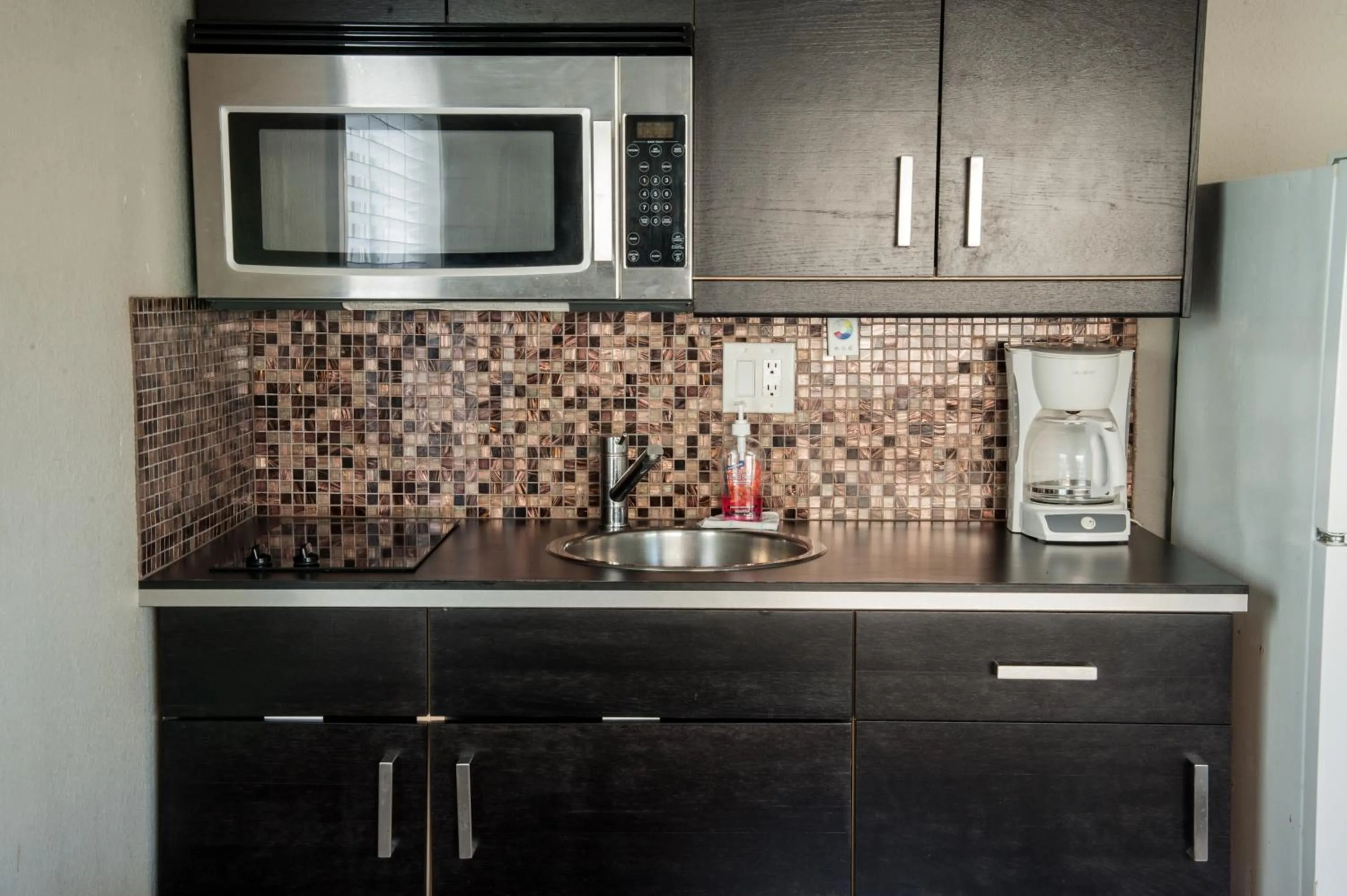 Kitchen or kitchenette in Sun Beach Inn