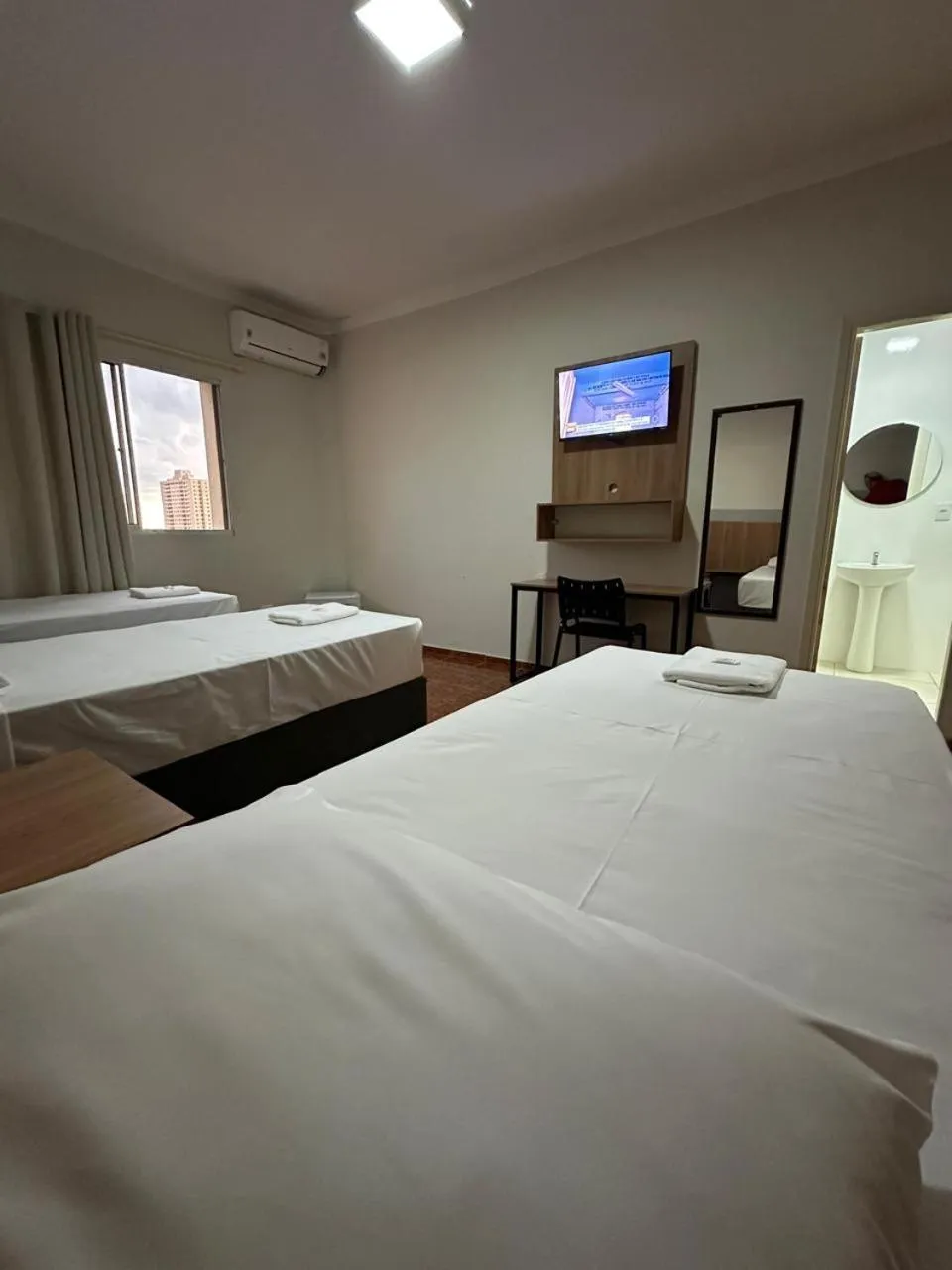 Bed in Novo Hotel Uirapuru