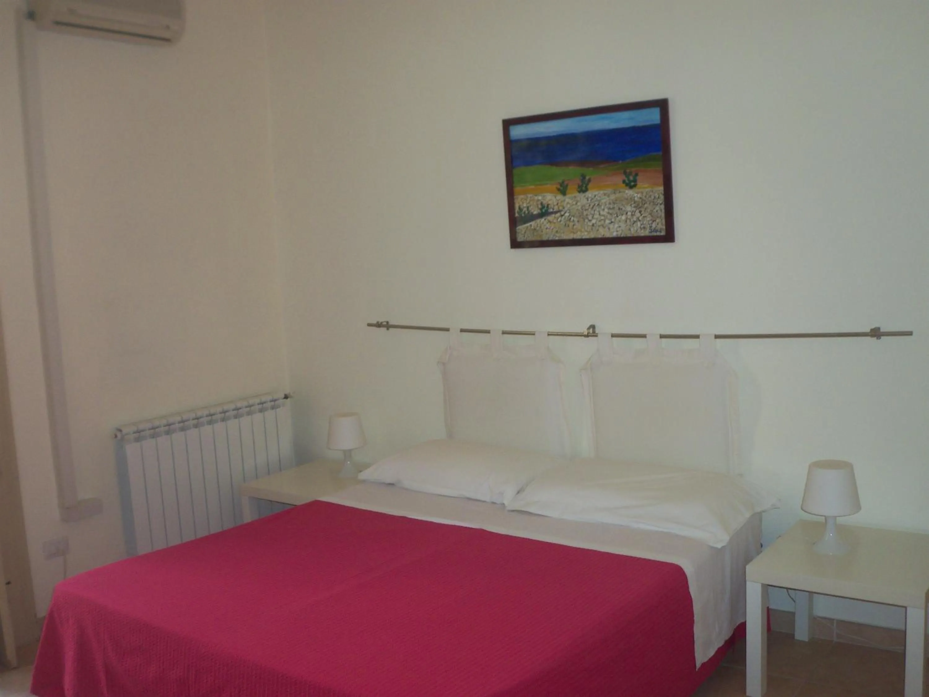 Photo of the whole room in B&B CARAVAGGIO basic rooms near Ortigia