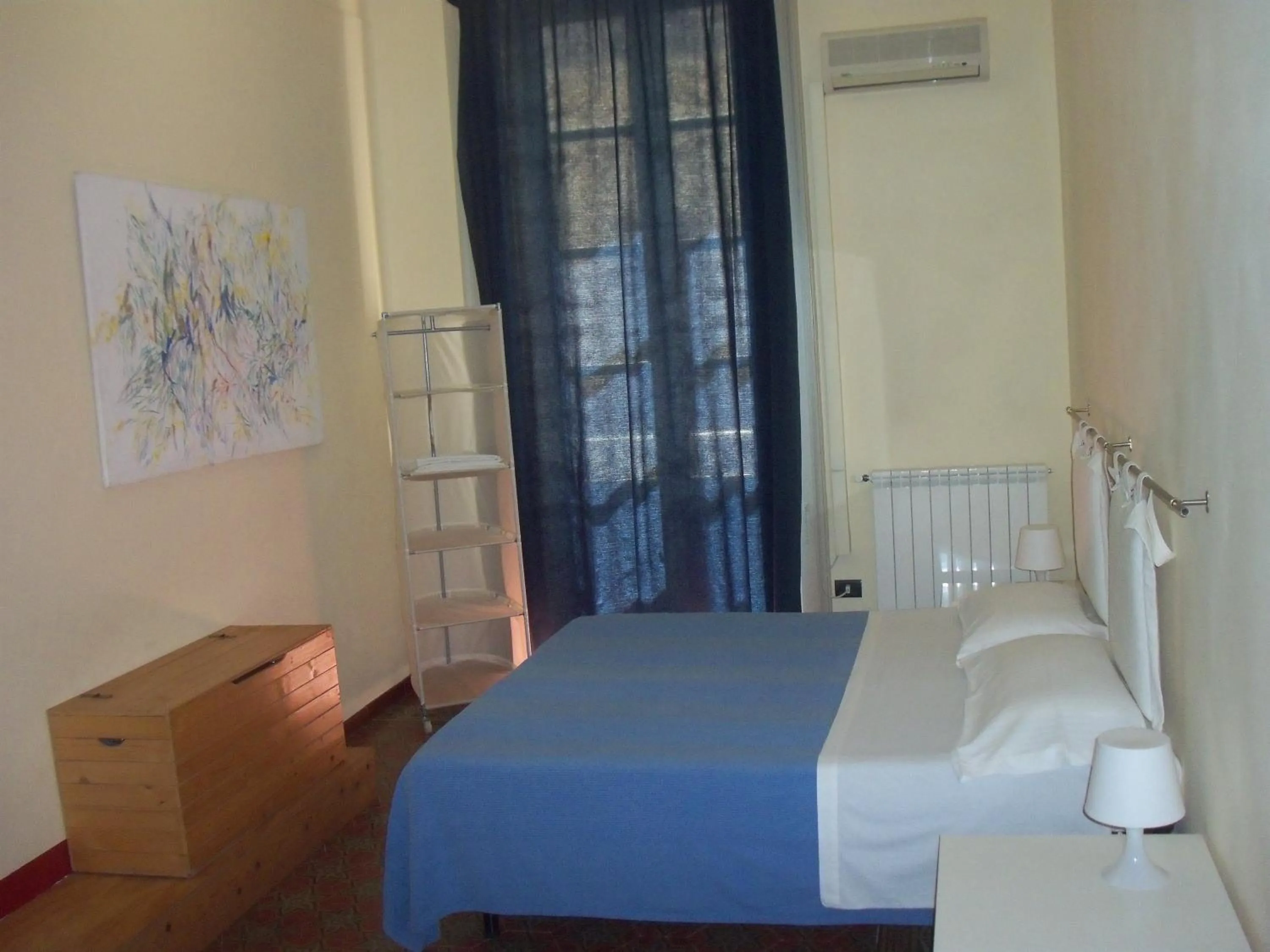 Photo of the whole room in B&B CARAVAGGIO basic rooms near Ortigia