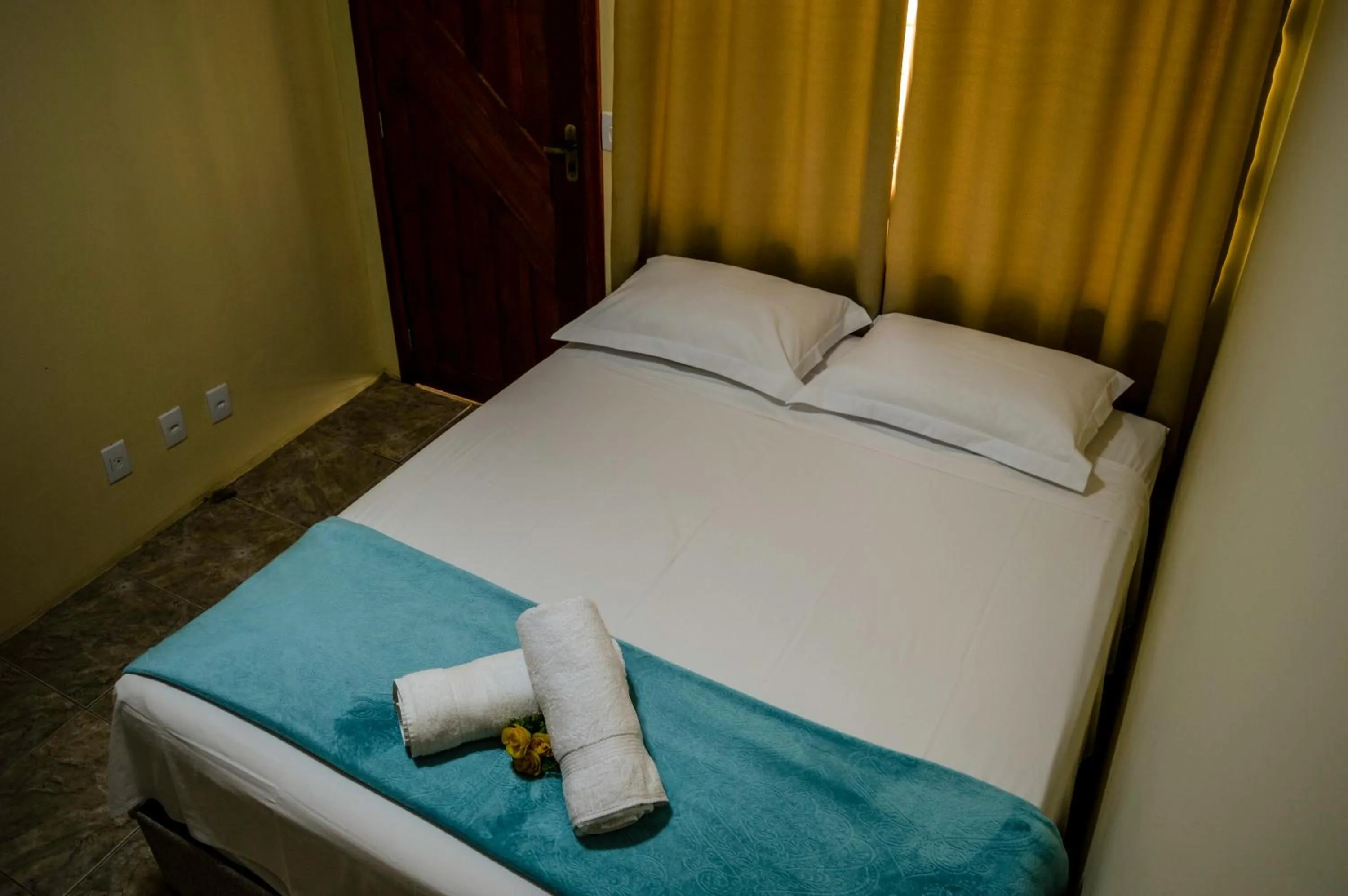 Bed in Pousada Vila Regina