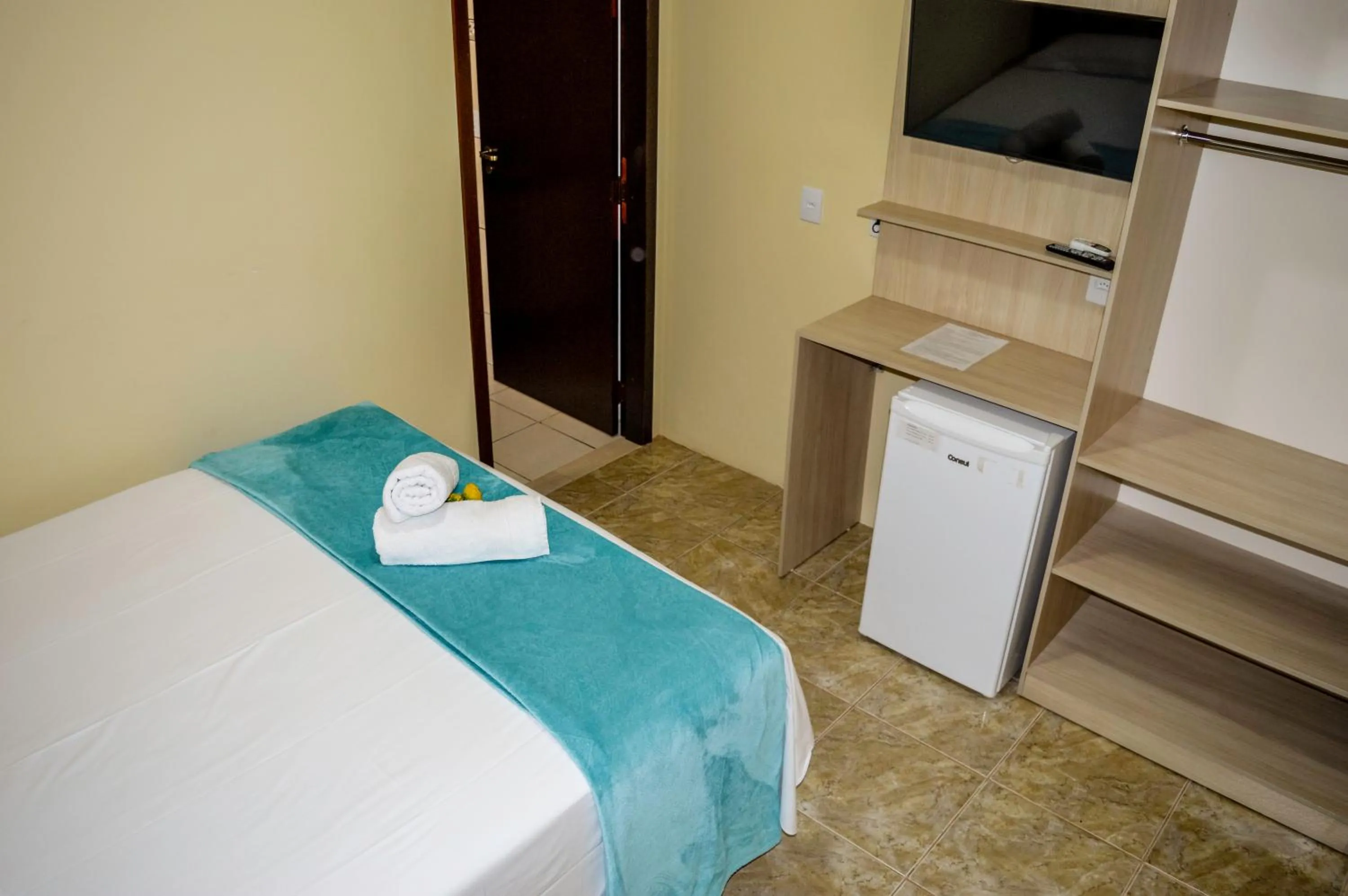 Bed in Pousada Vila Regina