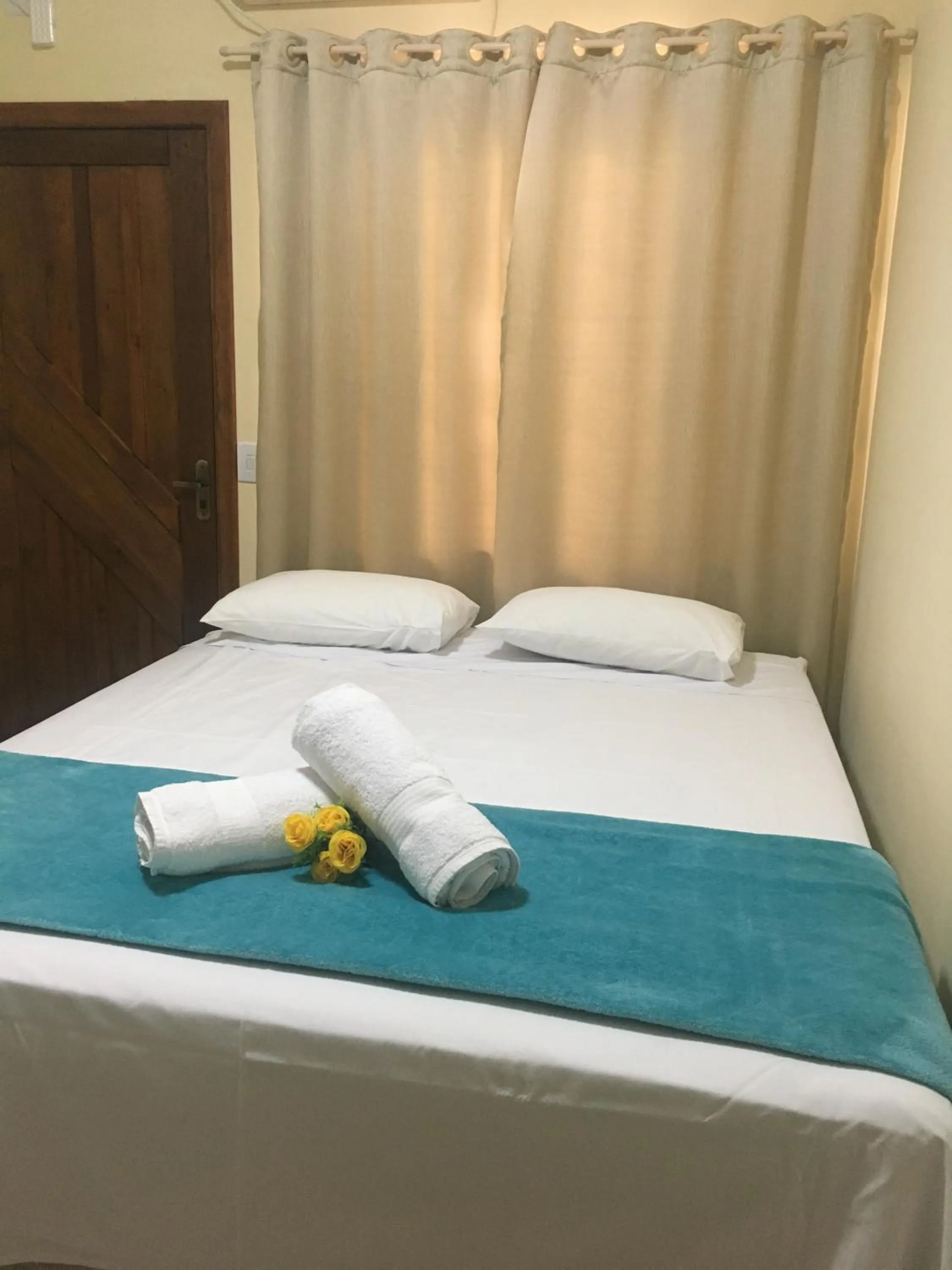 Bed in Pousada Vila Regina