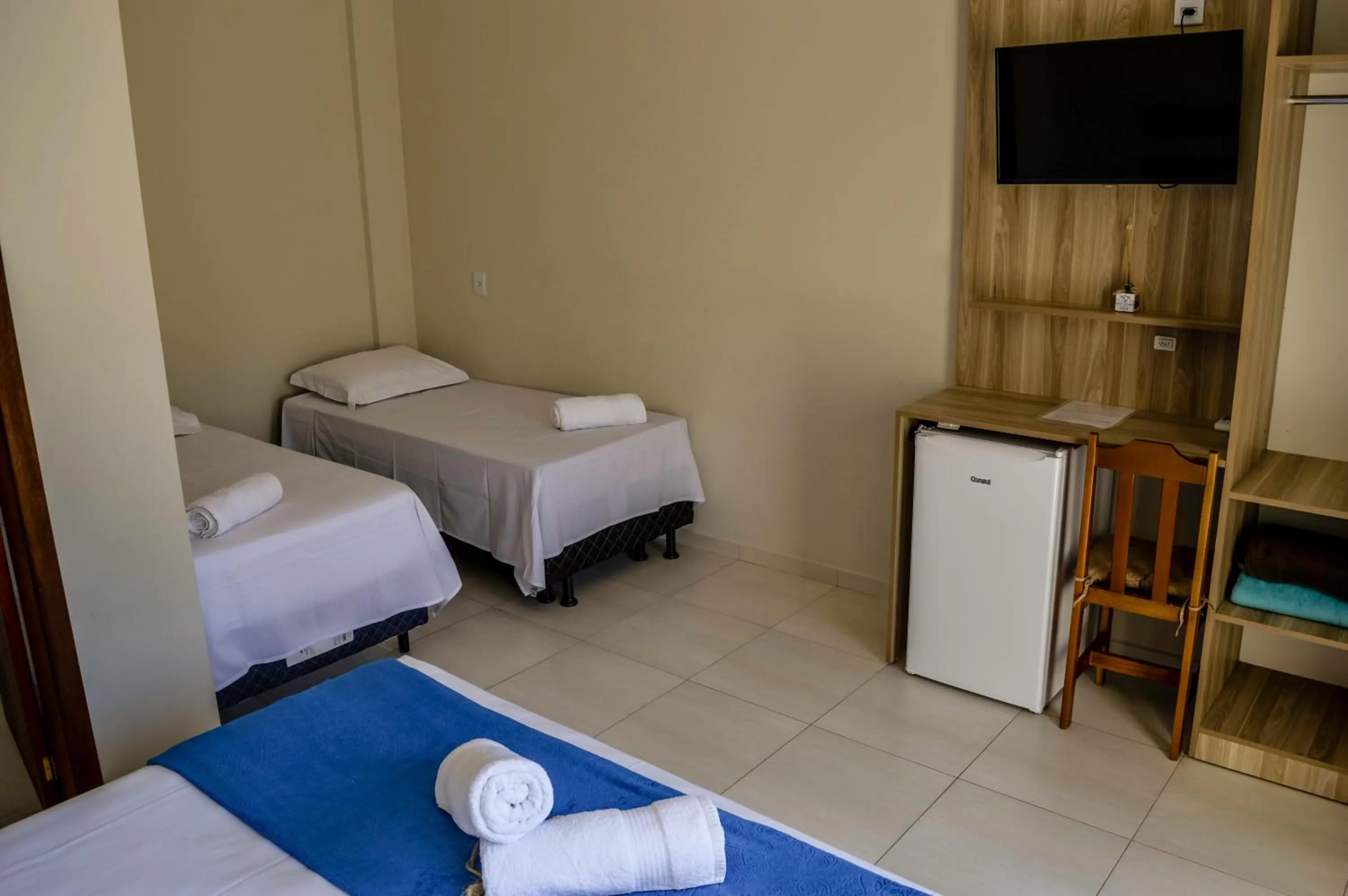 Bed in Pousada Vila Regina