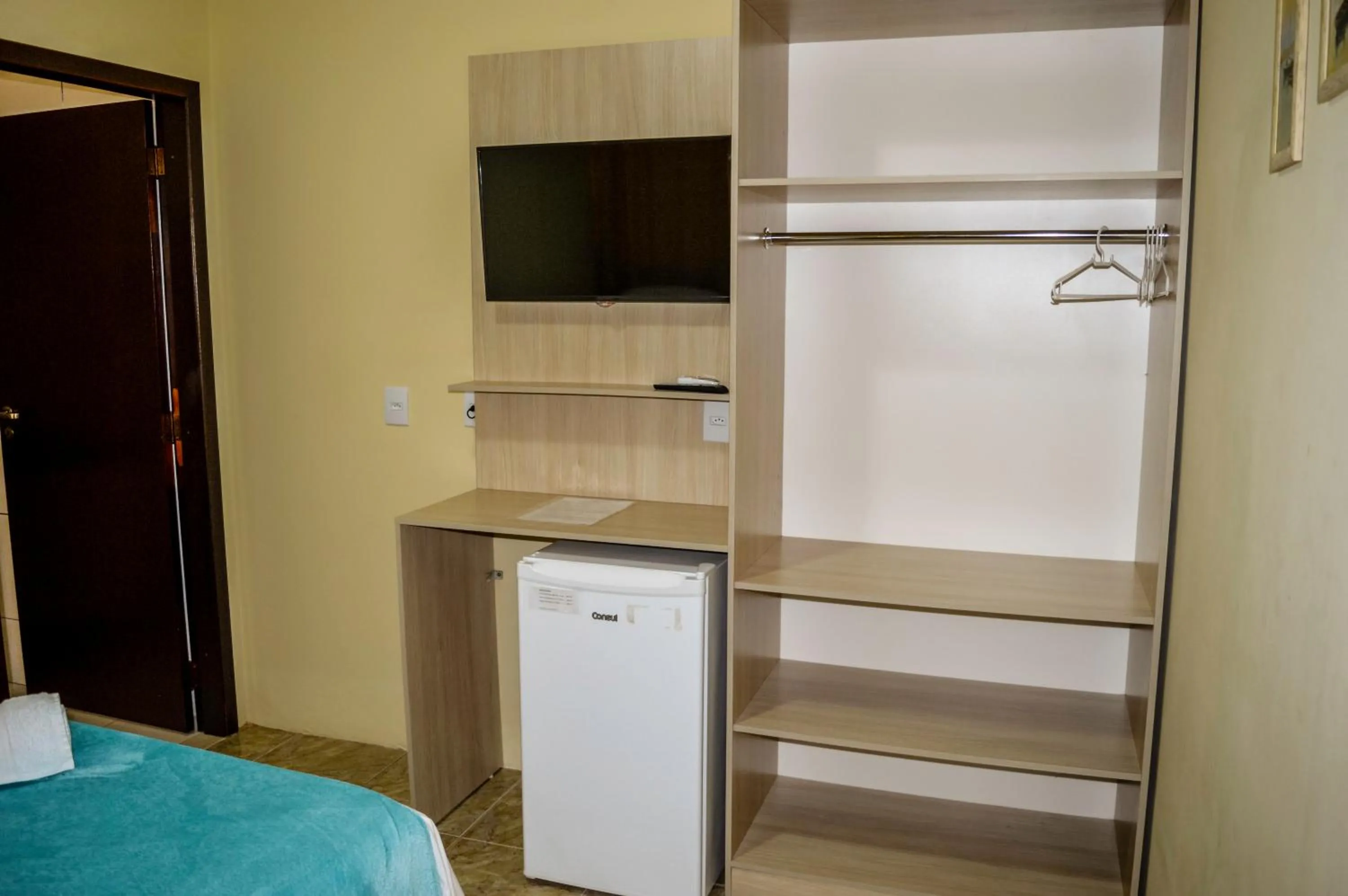 Bed in Pousada Vila Regina