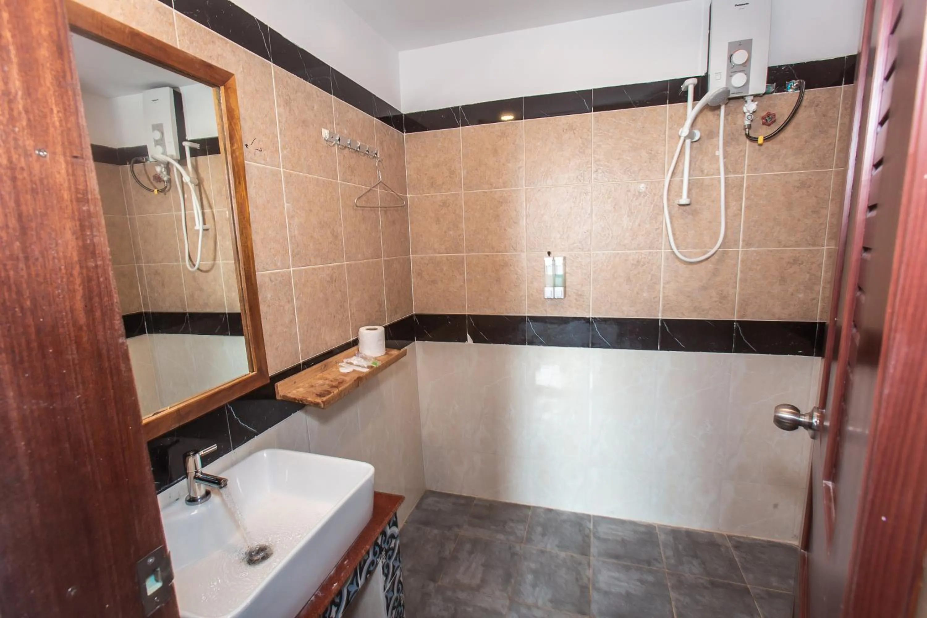 Toilet in Grand Elevation Hotel