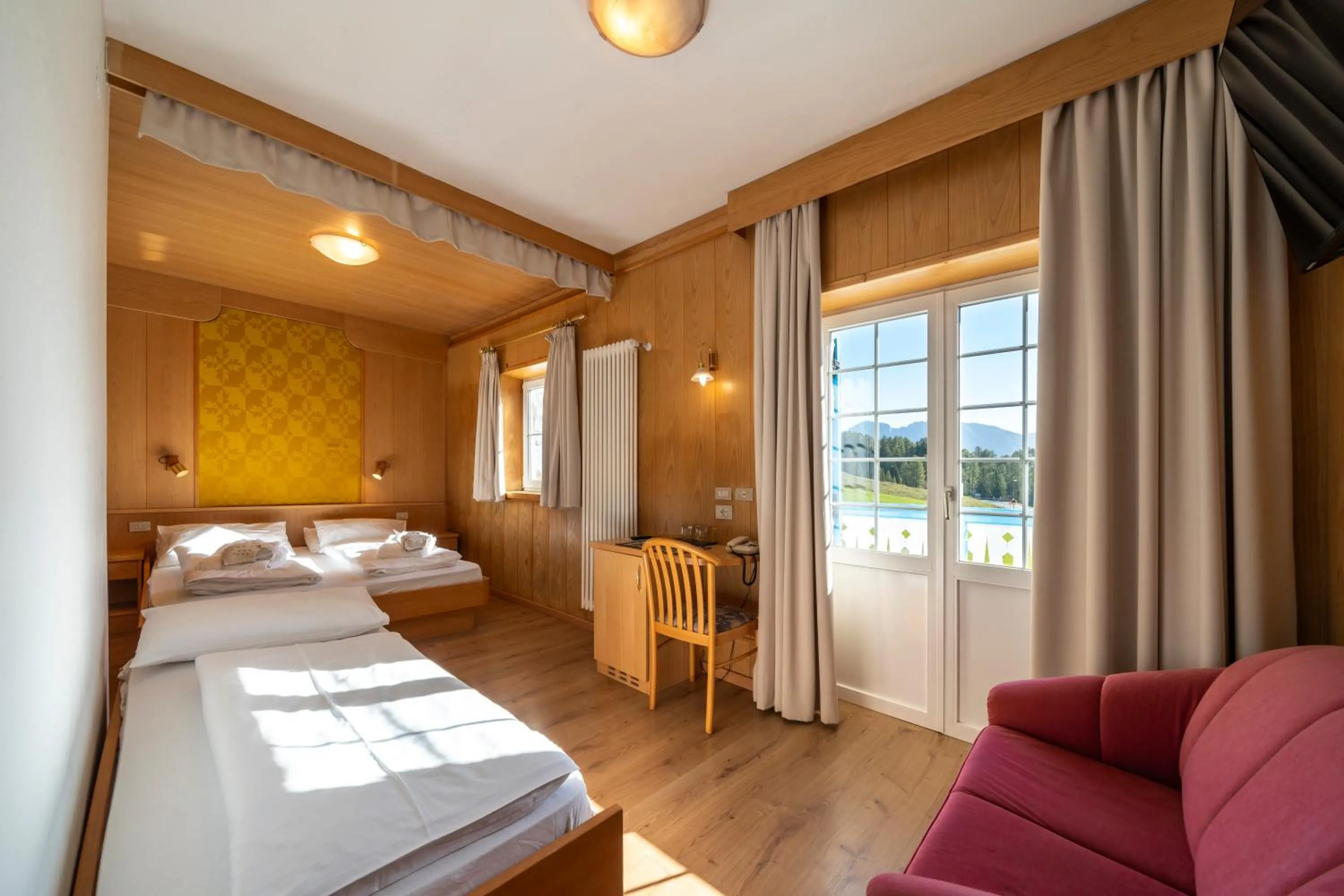 Bed in MyTime Hotels Savoy