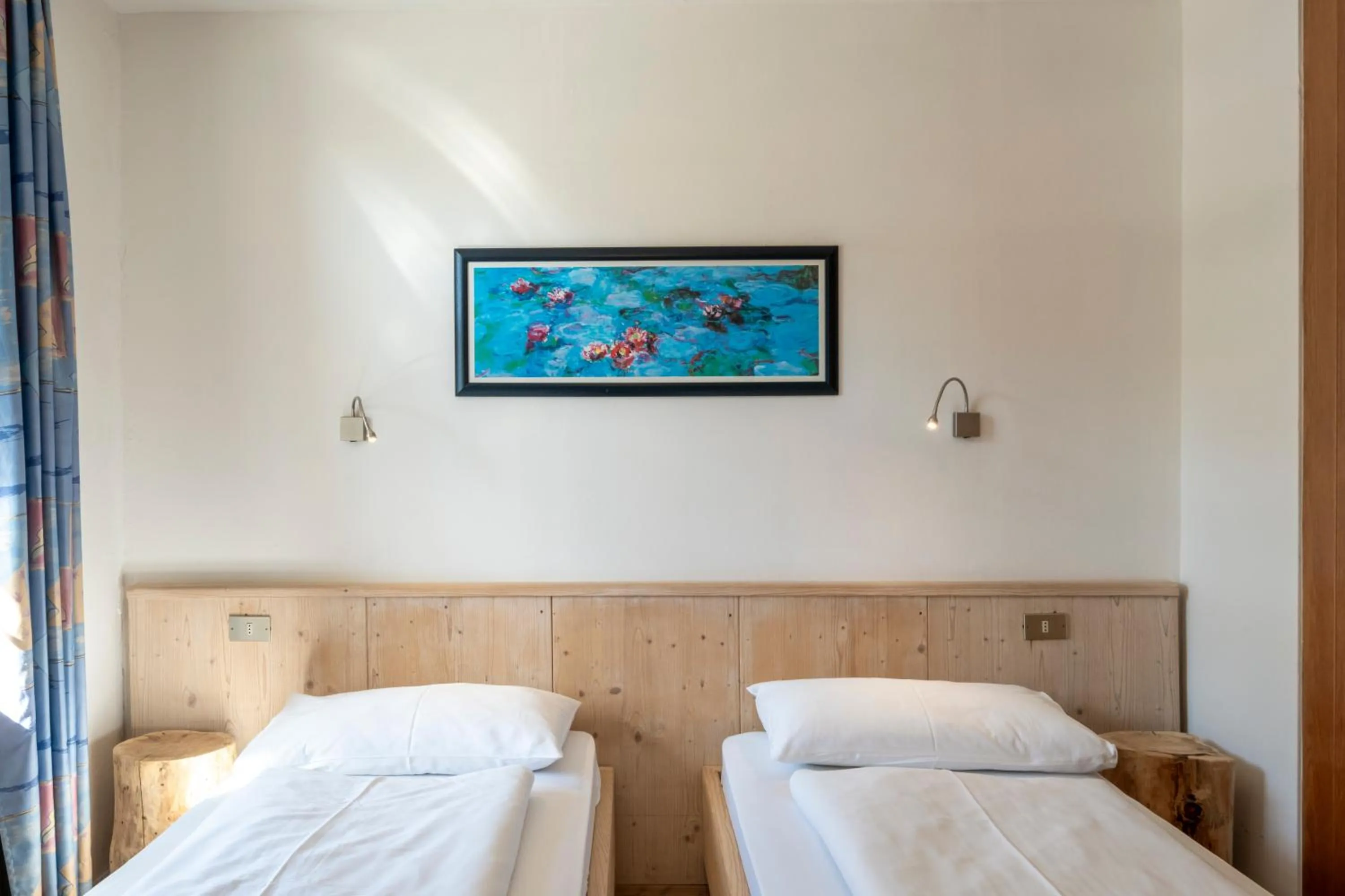 Bed in MyTime Hotels Savoy