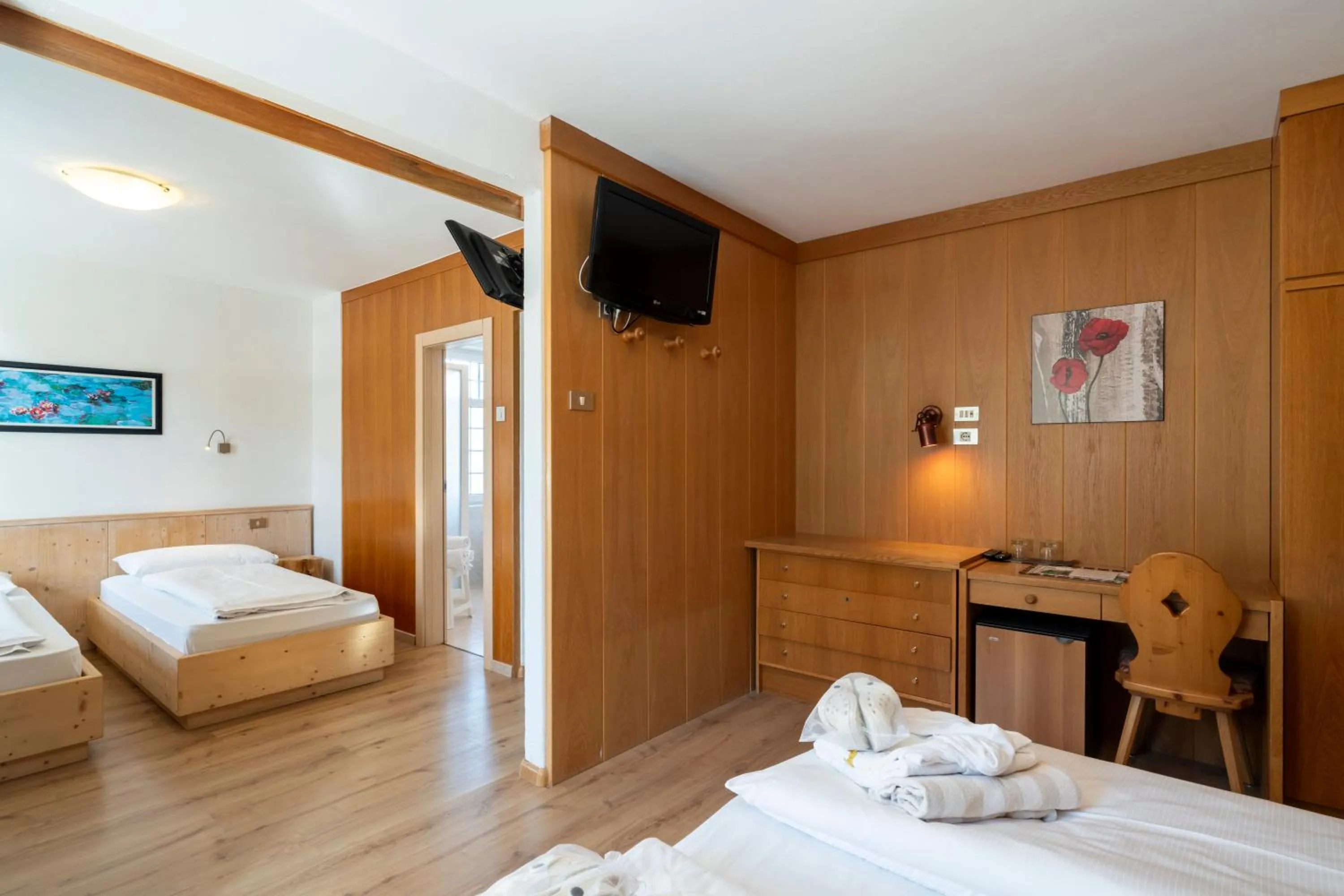 Bed in MyTime Hotels Savoy