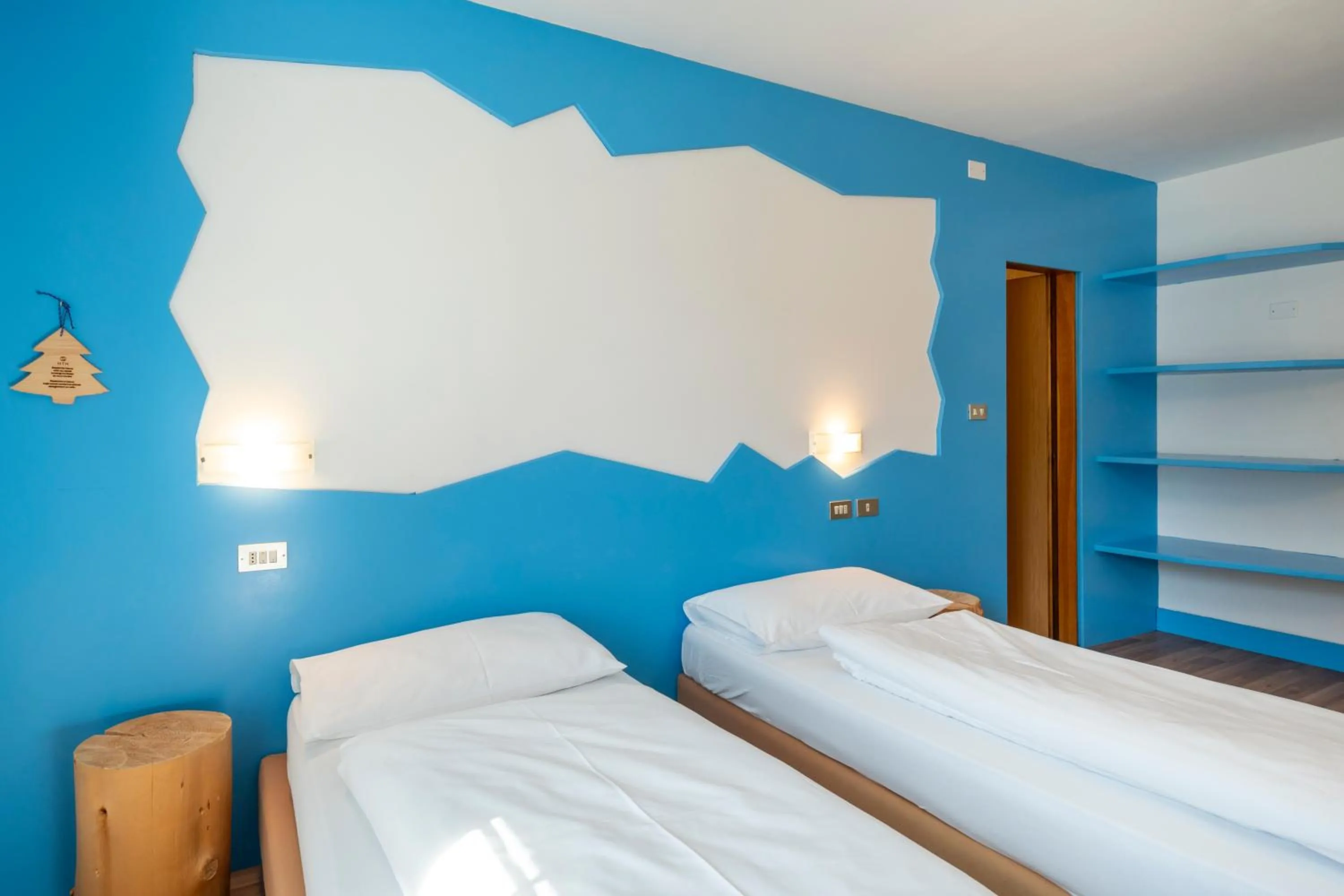 Bed in MyTime Hotels Savoy