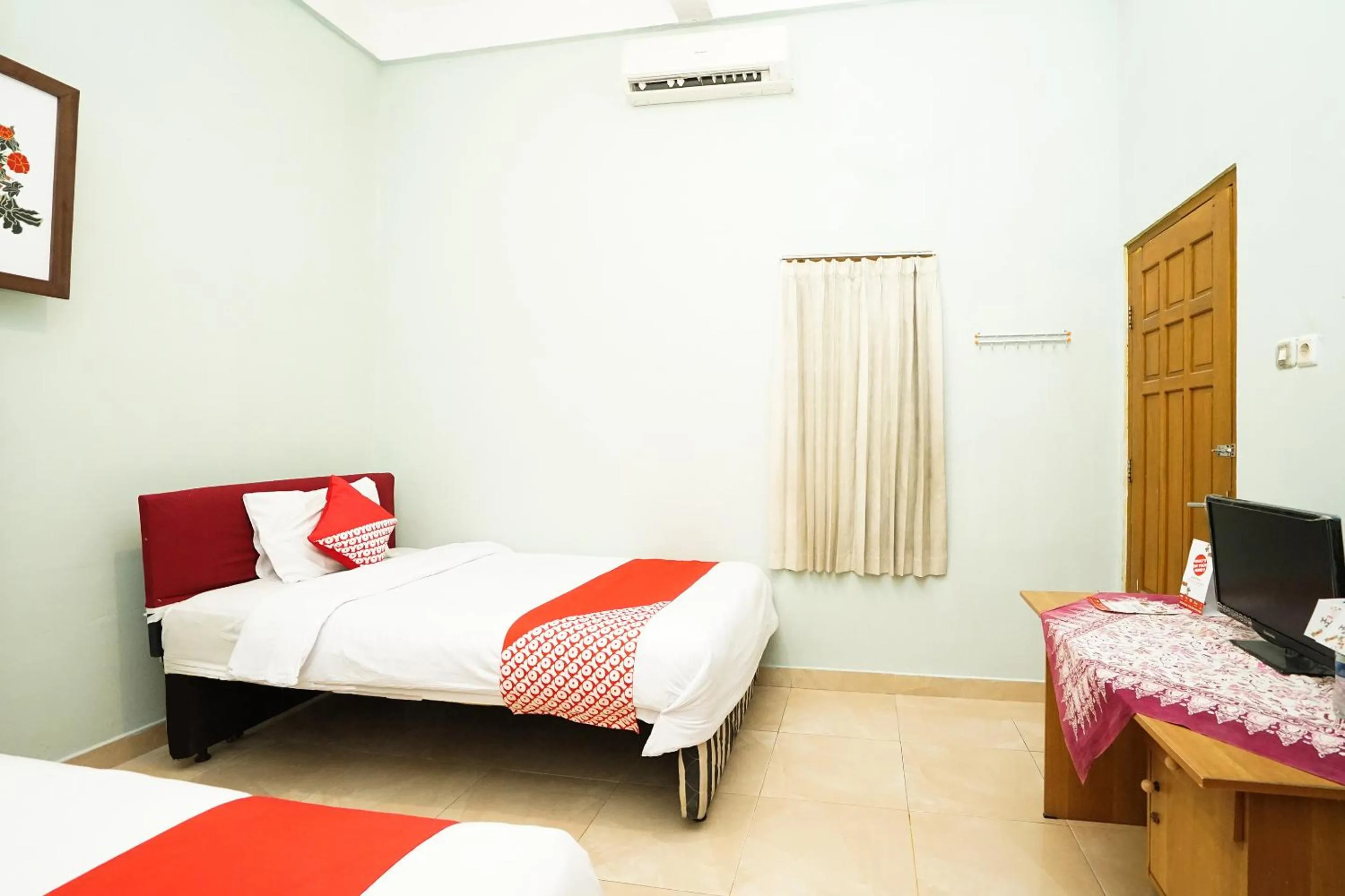 Bedroom, Bed in Kartika Syariah Homestay by Stayku