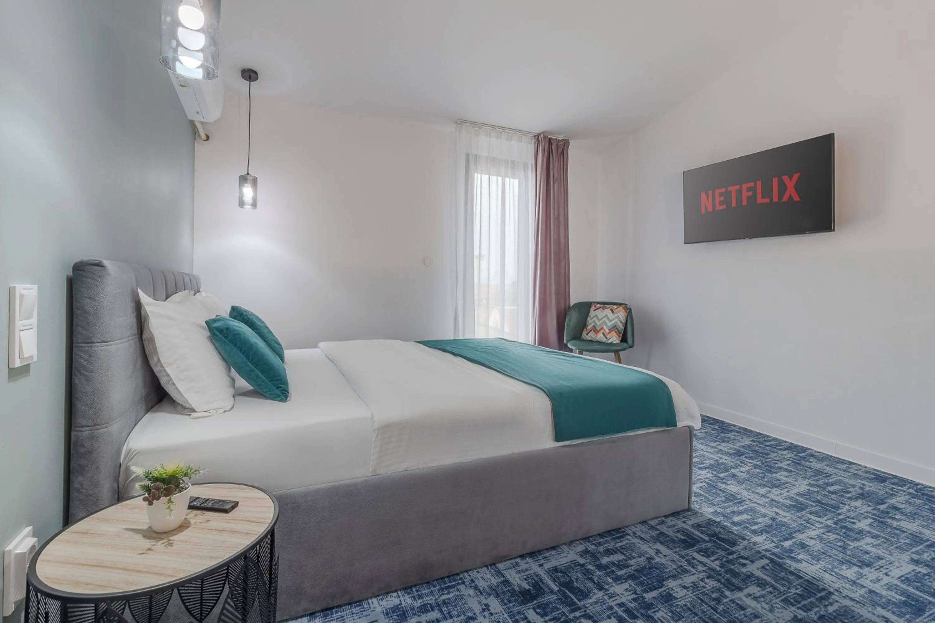 Bed in Aparthotel Aria Boutique