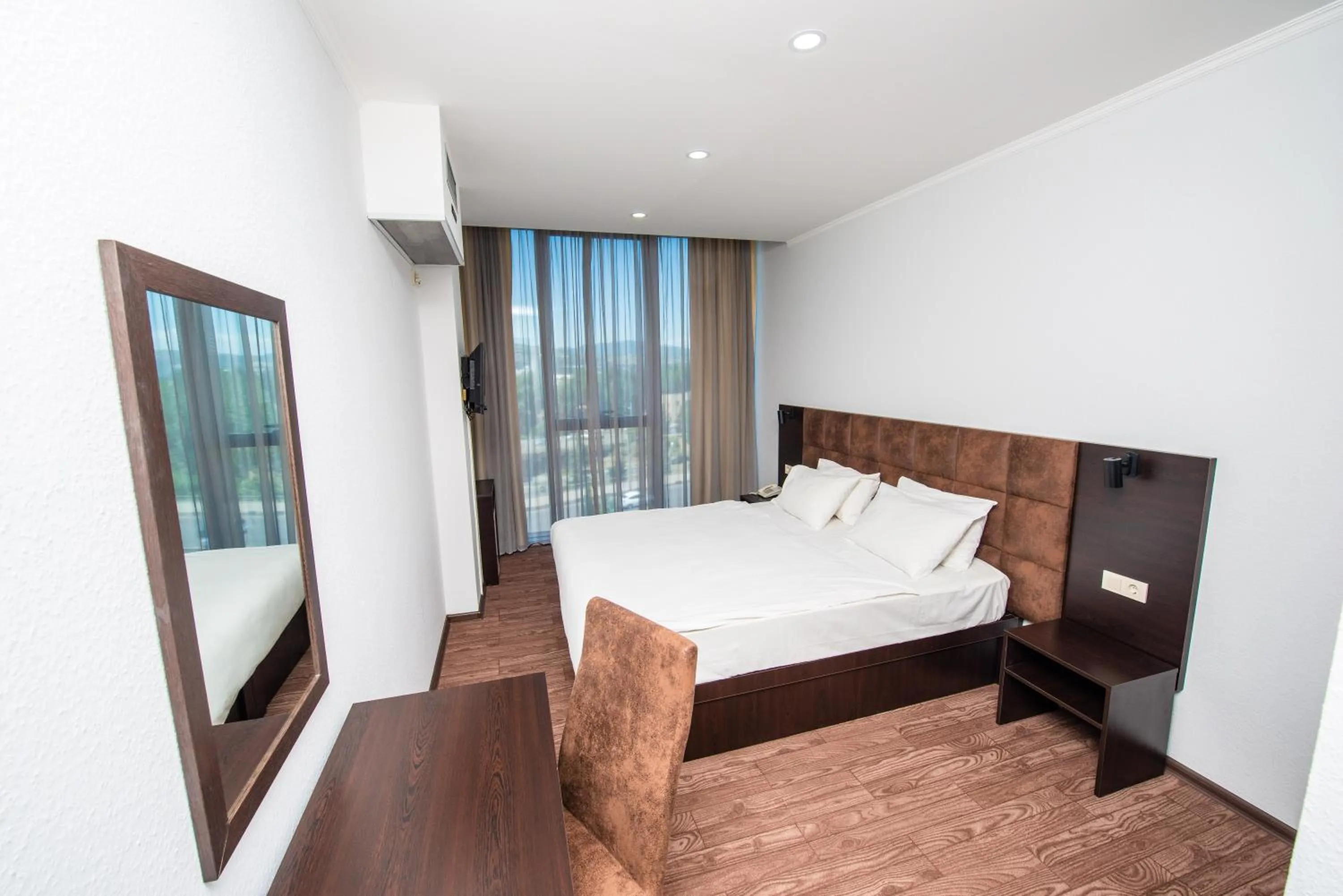 Bed in Hotel Shine Palace