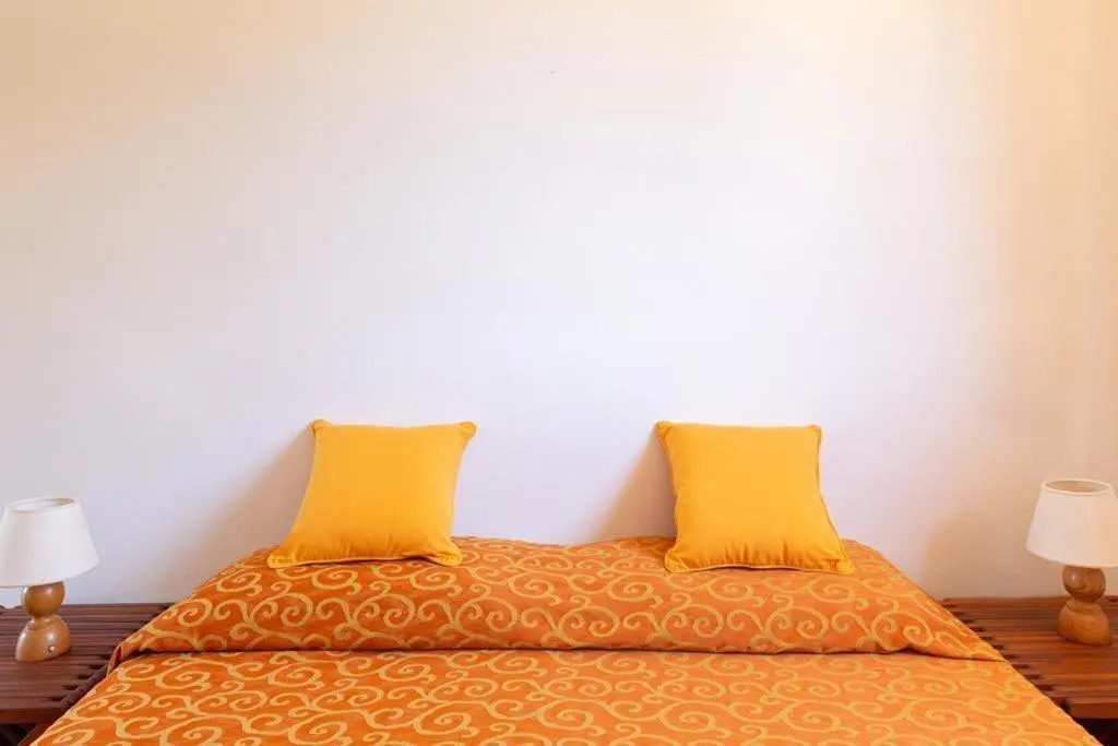 Photo of the whole room, Bed in Gitavillage Il Gabbiano