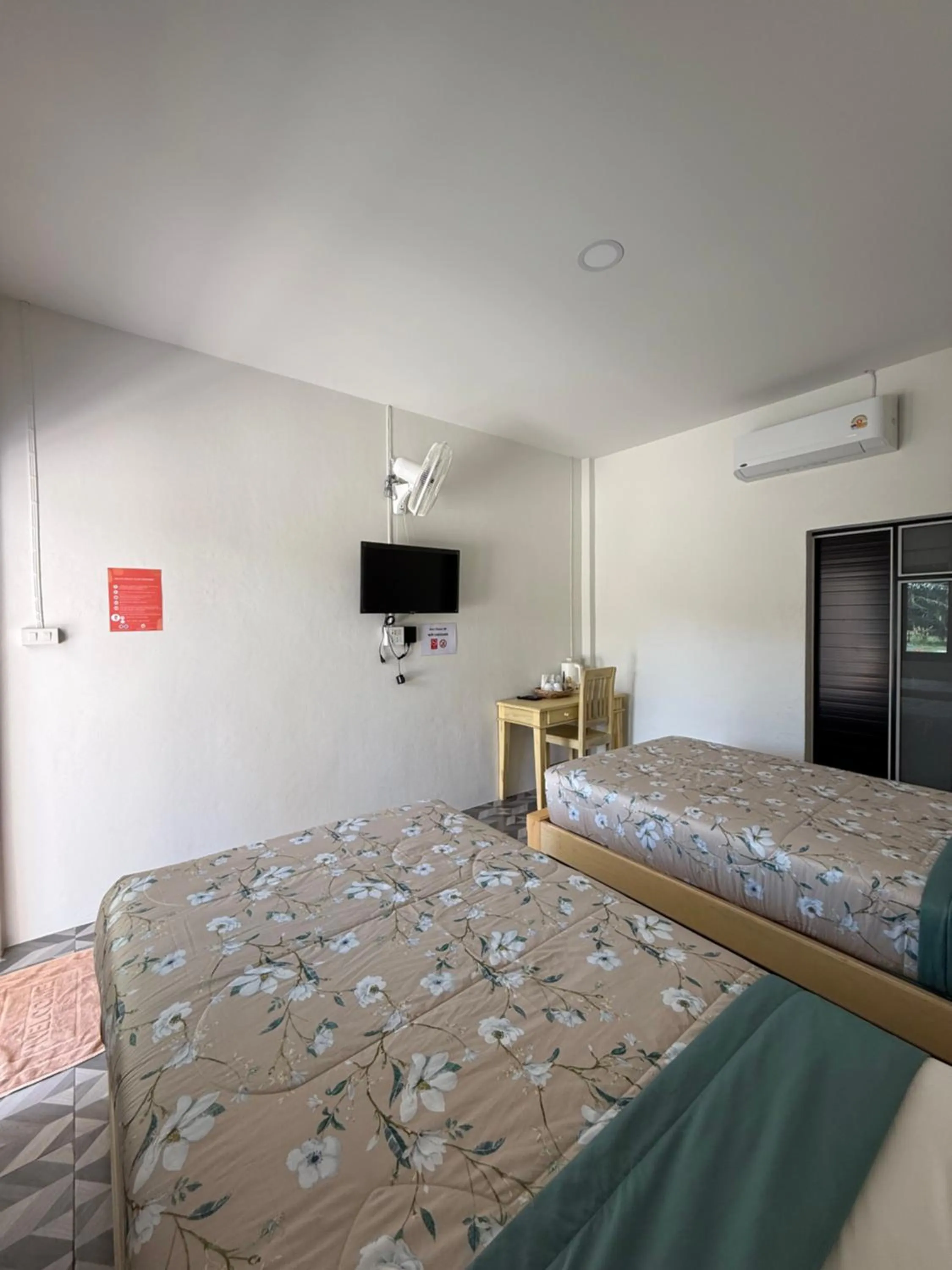 Bed in Baan Suan Nam Resort