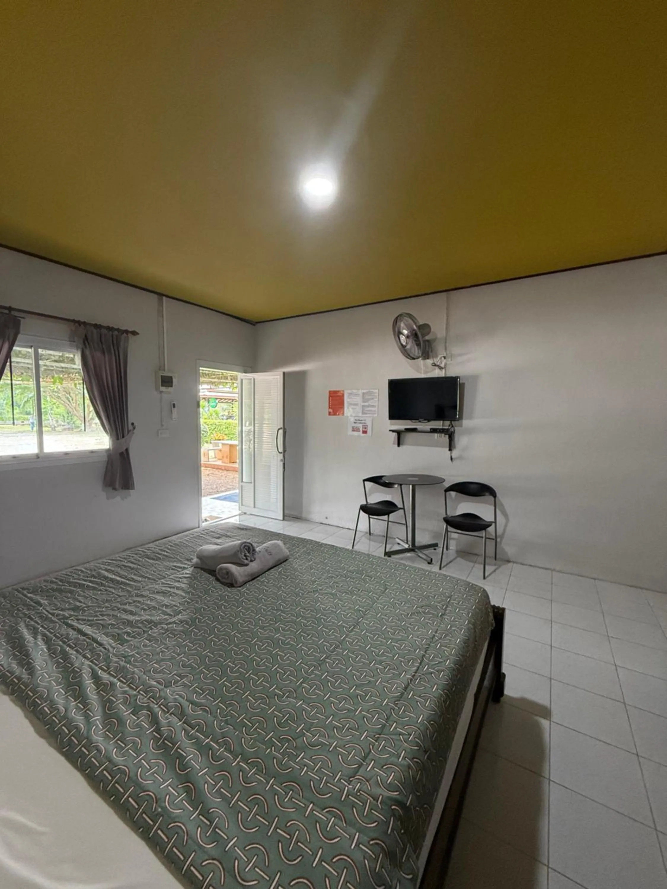 Bed in Baan Suan Nam Resort