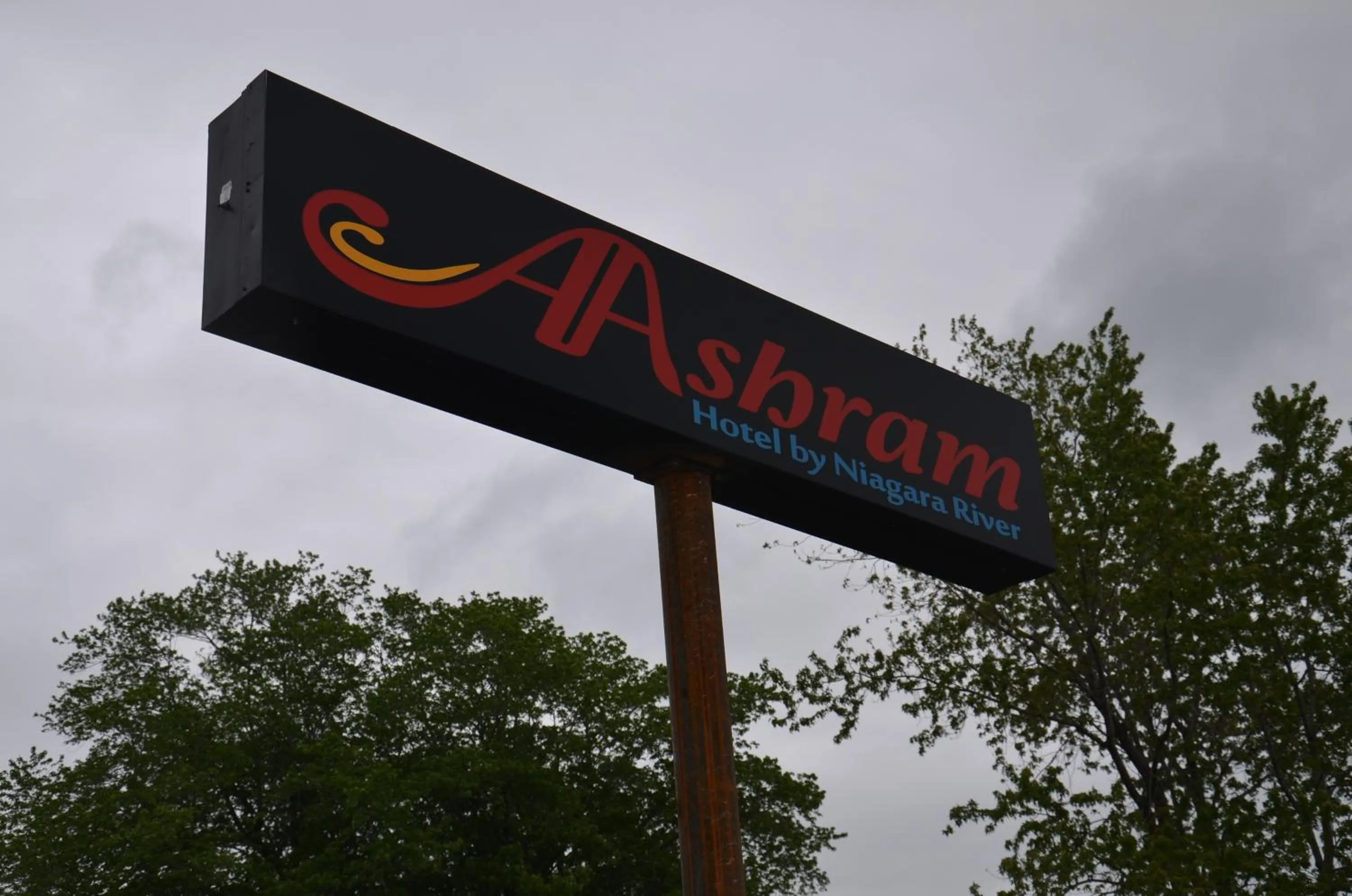 Logo/Certificate/Sign in Aashram Hotel by Niagara River