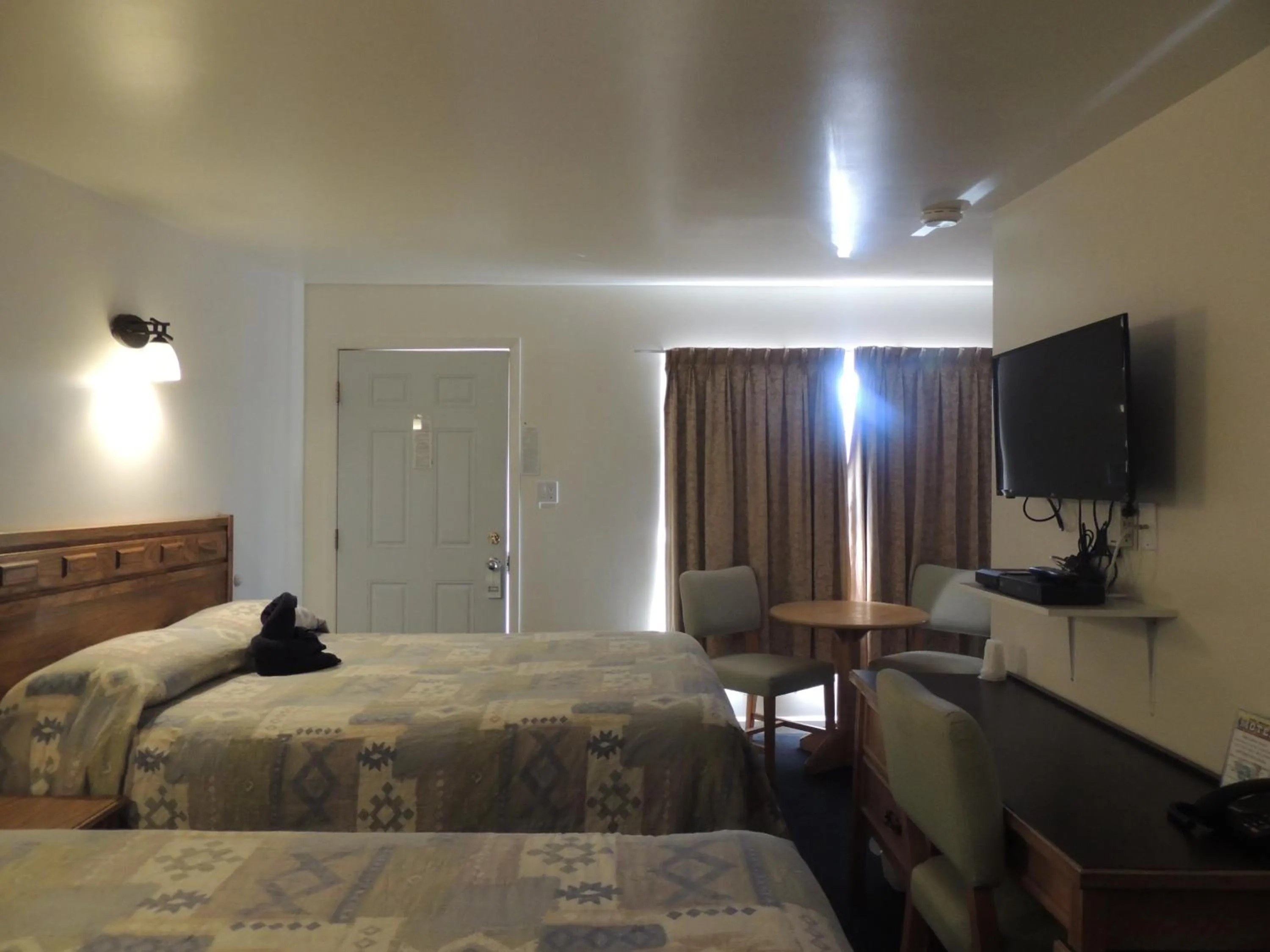 Photo of the whole room, Bed in 100 Mile Motel & RV Park