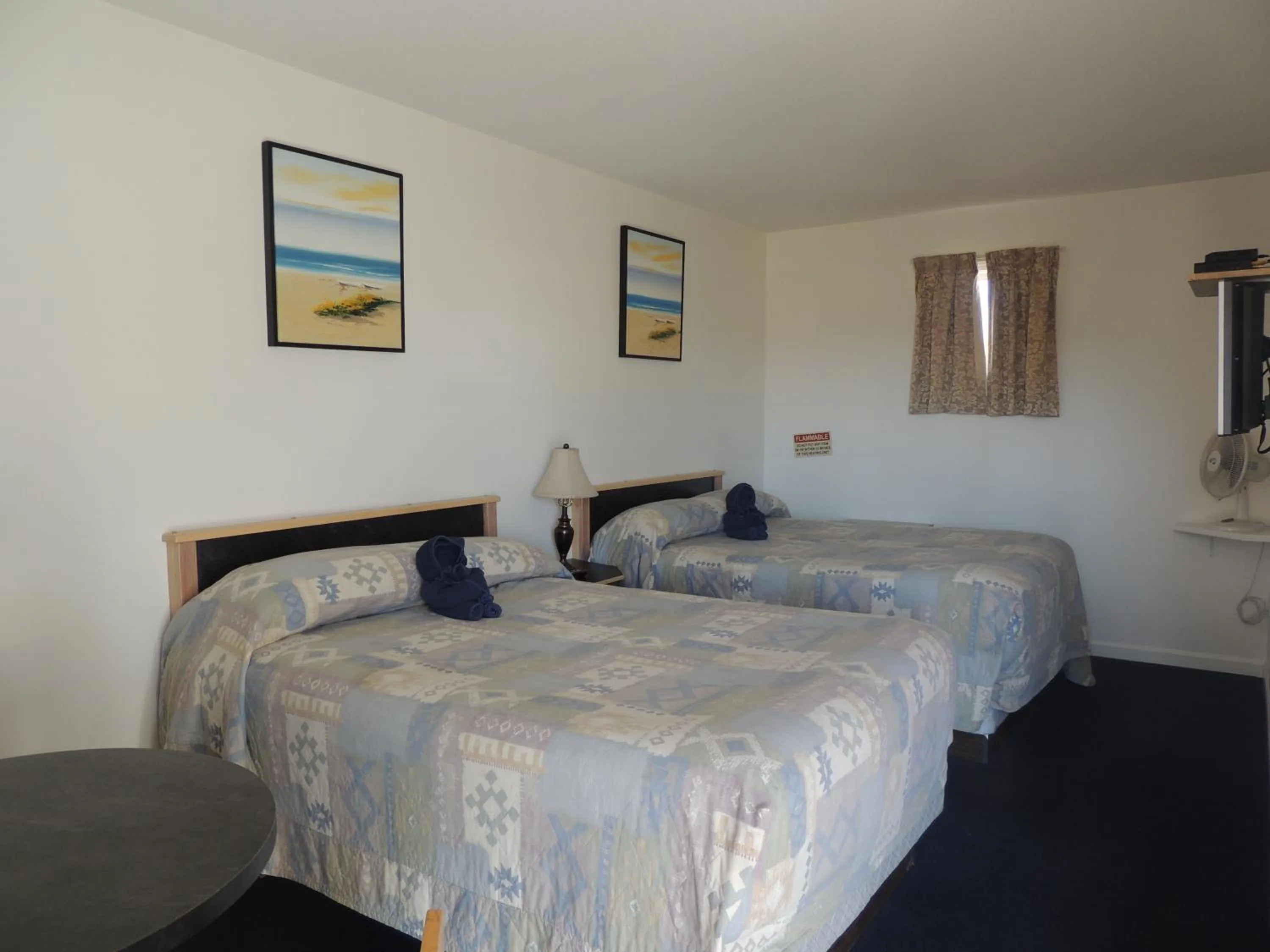 Bed in 100 Mile Motel & RV Park