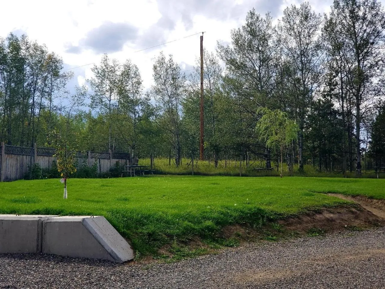 Property building in 100 Mile Motel & RV Park