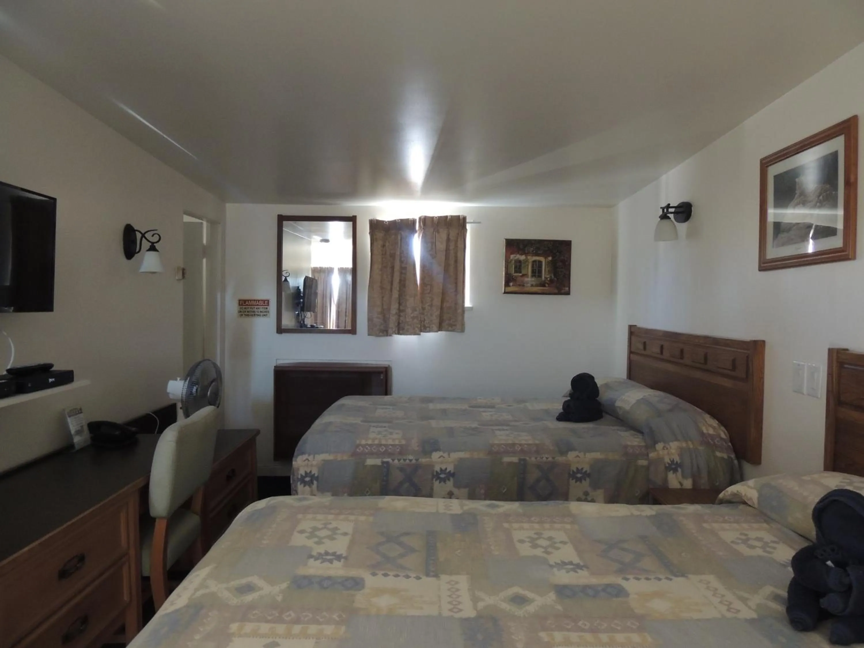 Photo of the whole room, Bed in 100 Mile Motel & RV Park