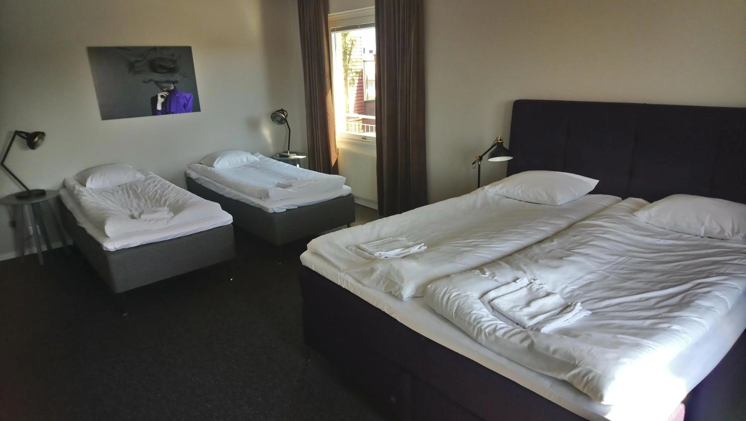 Photo of the whole room, Bed in BriQ Hotell