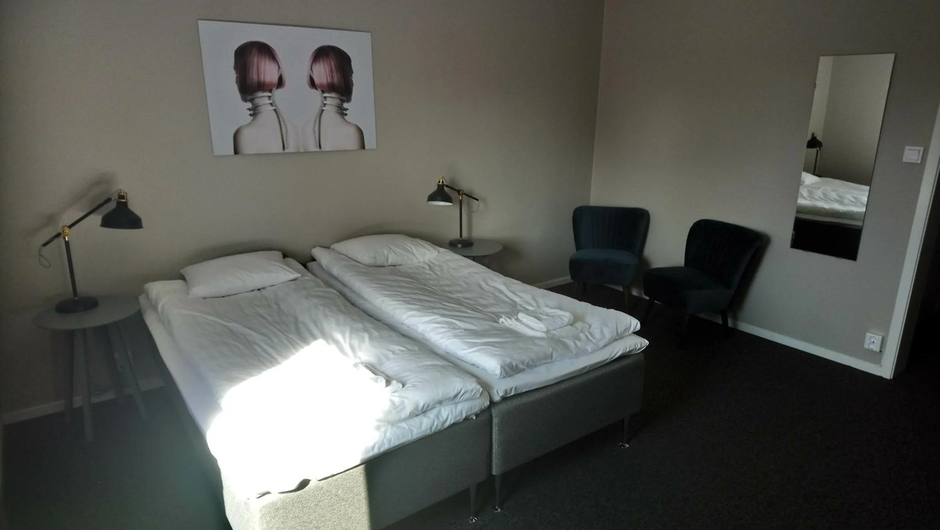 Photo of the whole room, Bed in BriQ Hotell