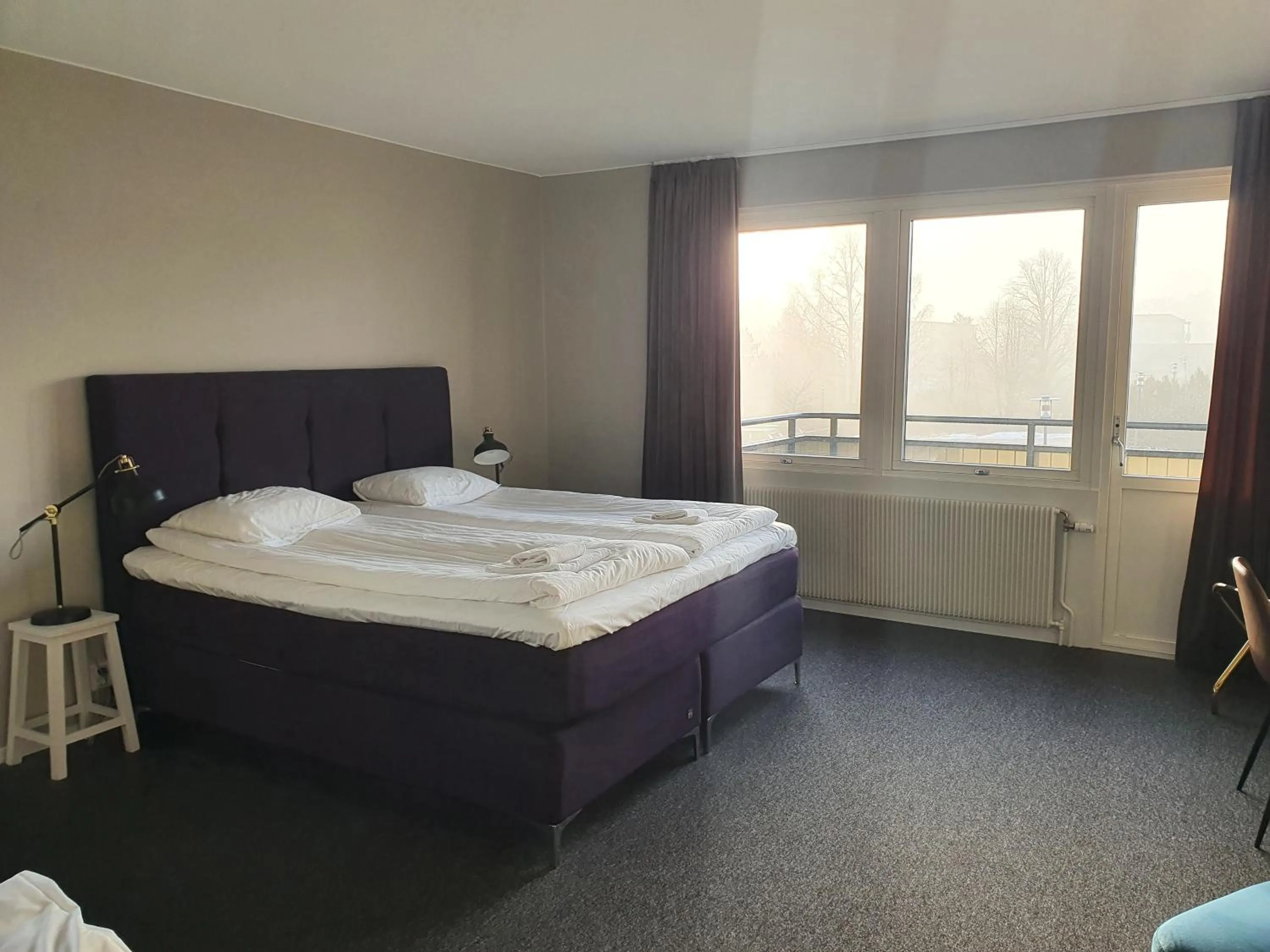 Photo of the whole room, Bed in BriQ Hotell