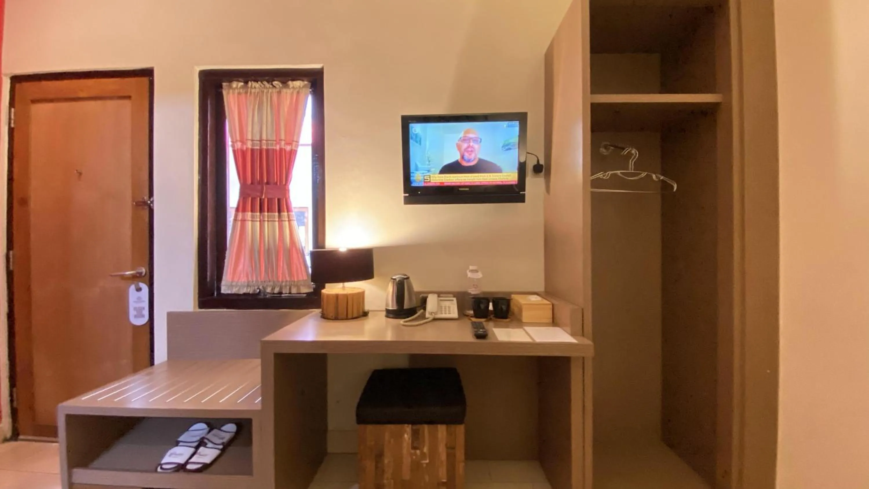 TV and multimedia in Mawar Asri Hotel