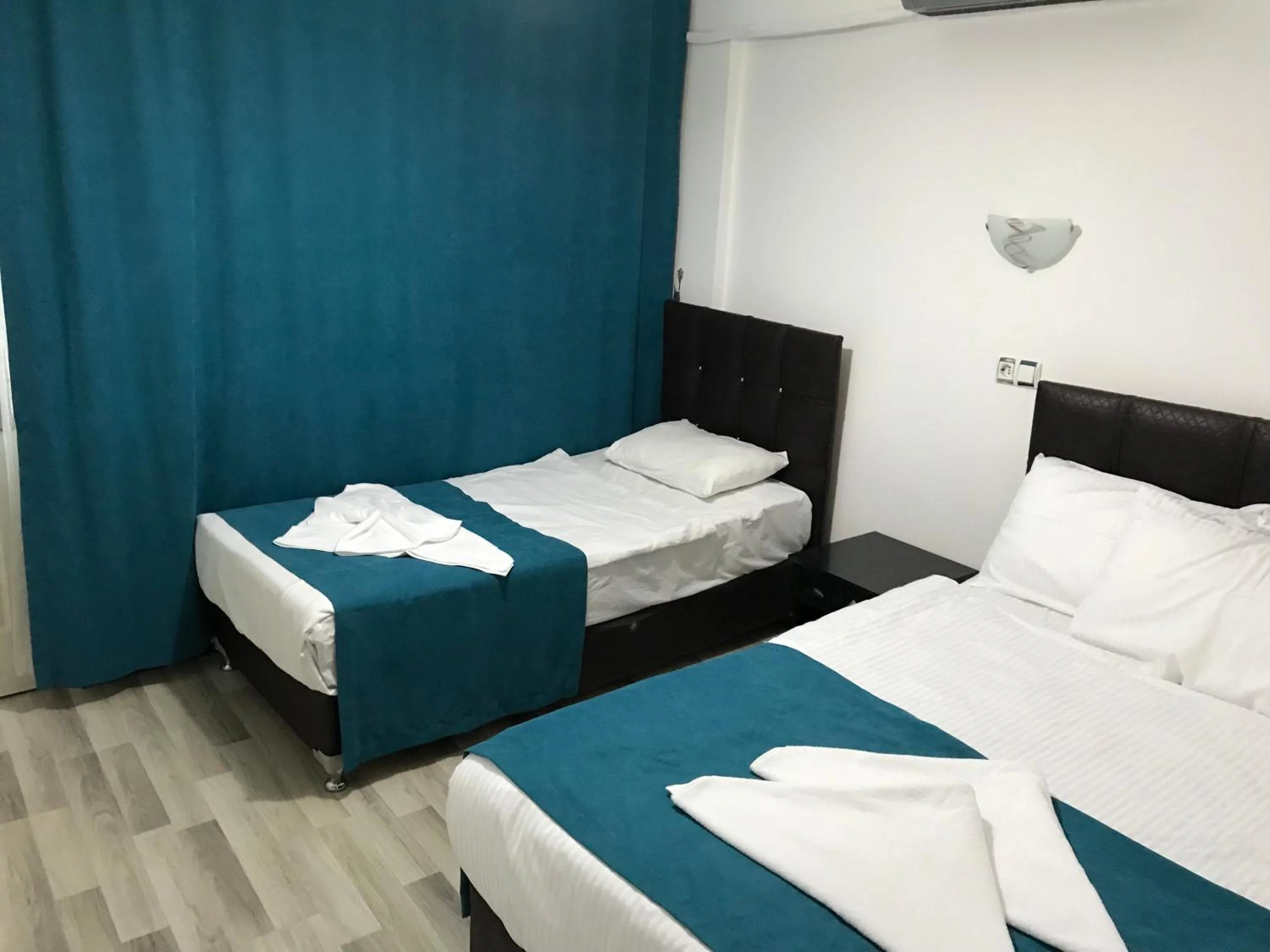 Bed in Sunrise Aya Hotel