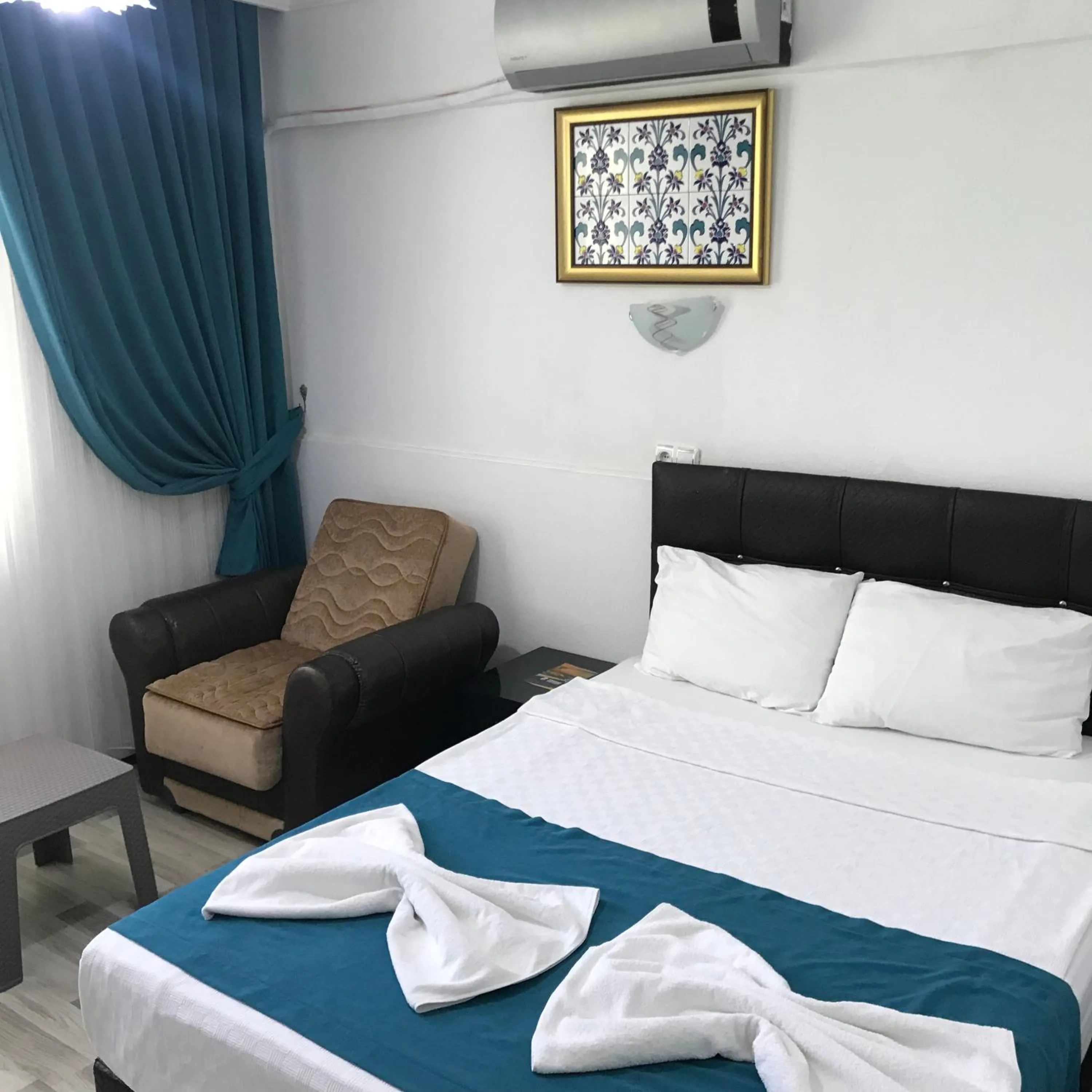 Bed in Sunrise Aya Hotel