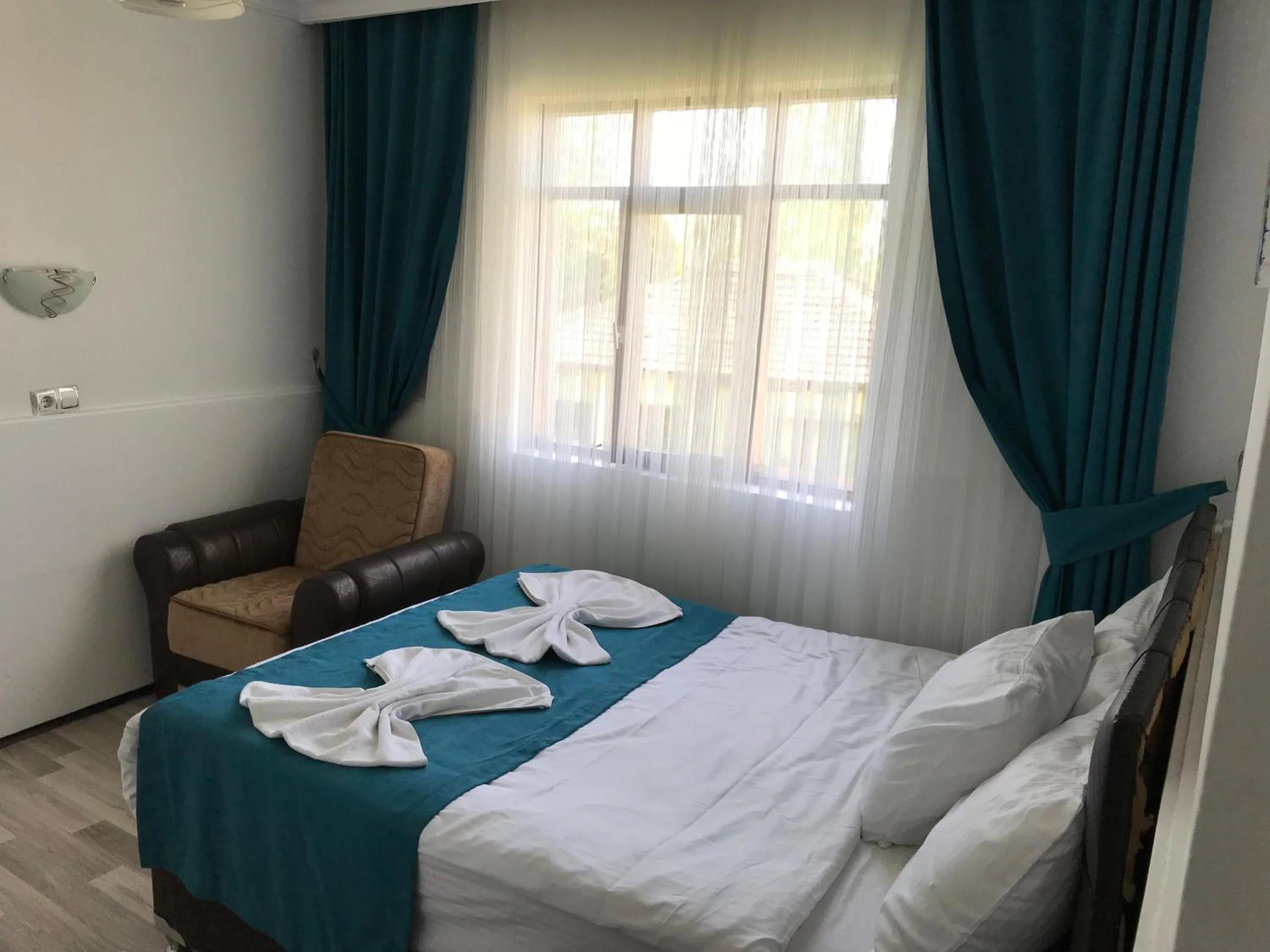 Bed in Sunrise Aya Hotel