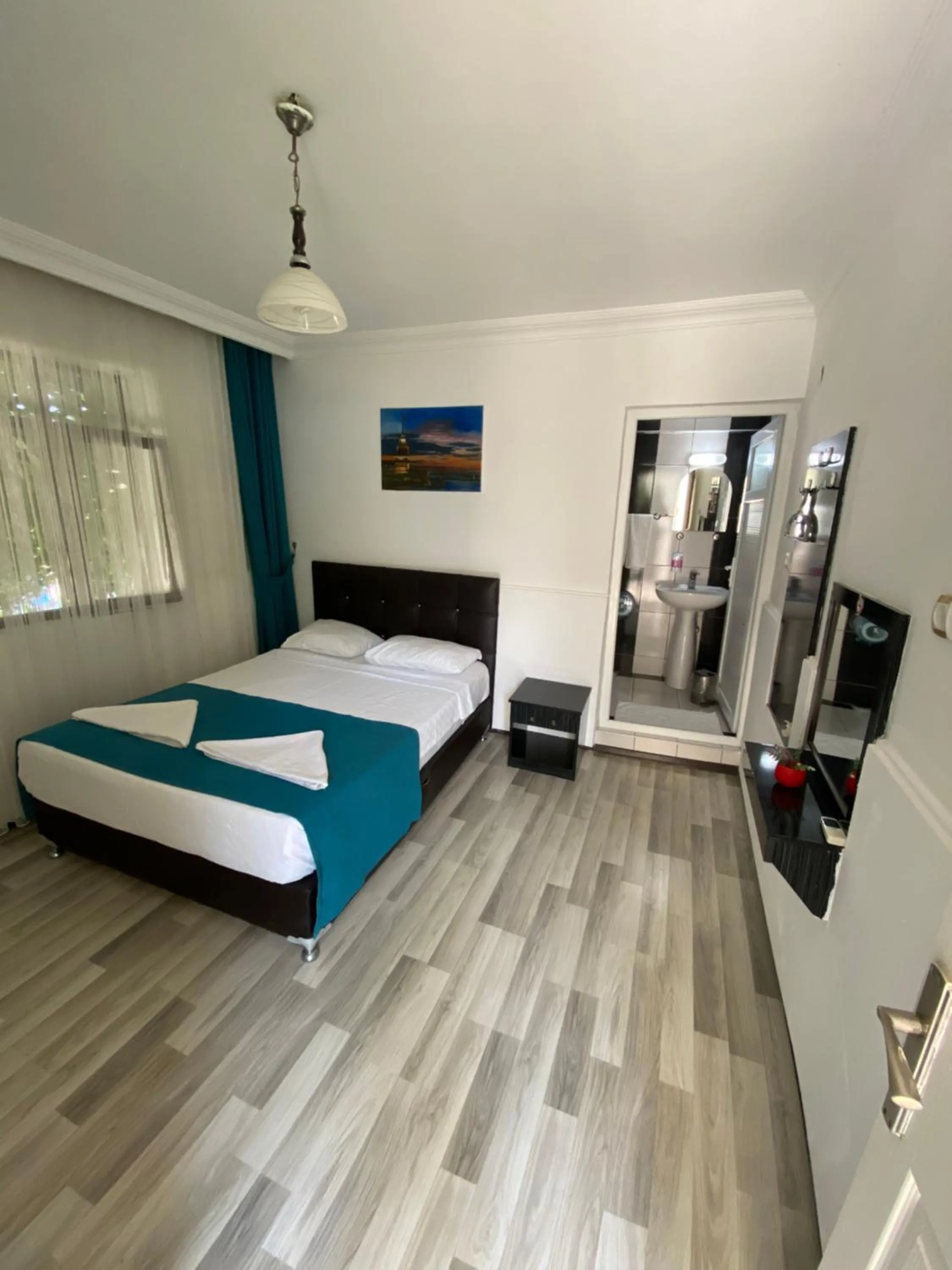 Bed in Sunrise Aya Hotel