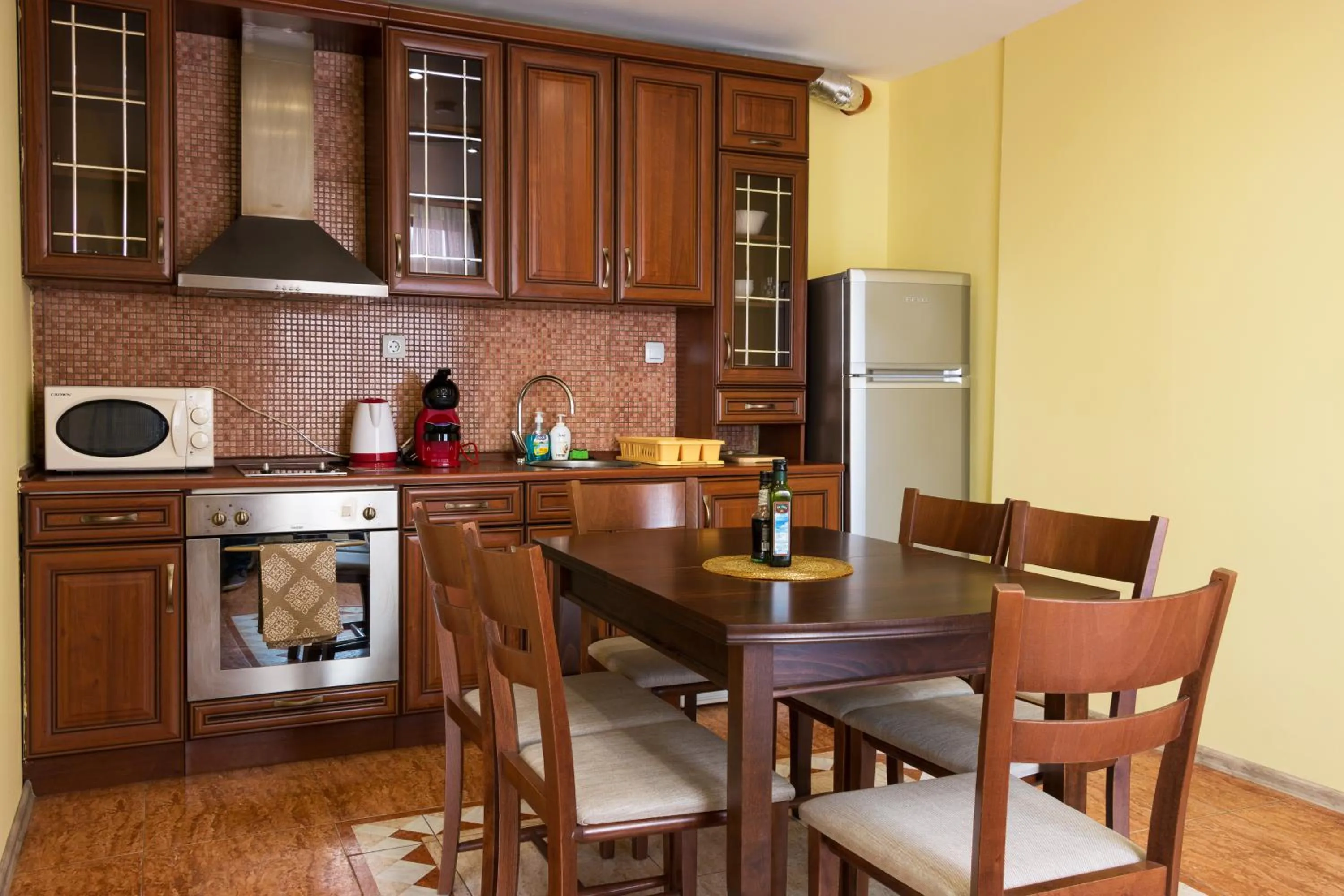 Kitchen or kitchenette in Apartments Nasini by Flat Mаnager