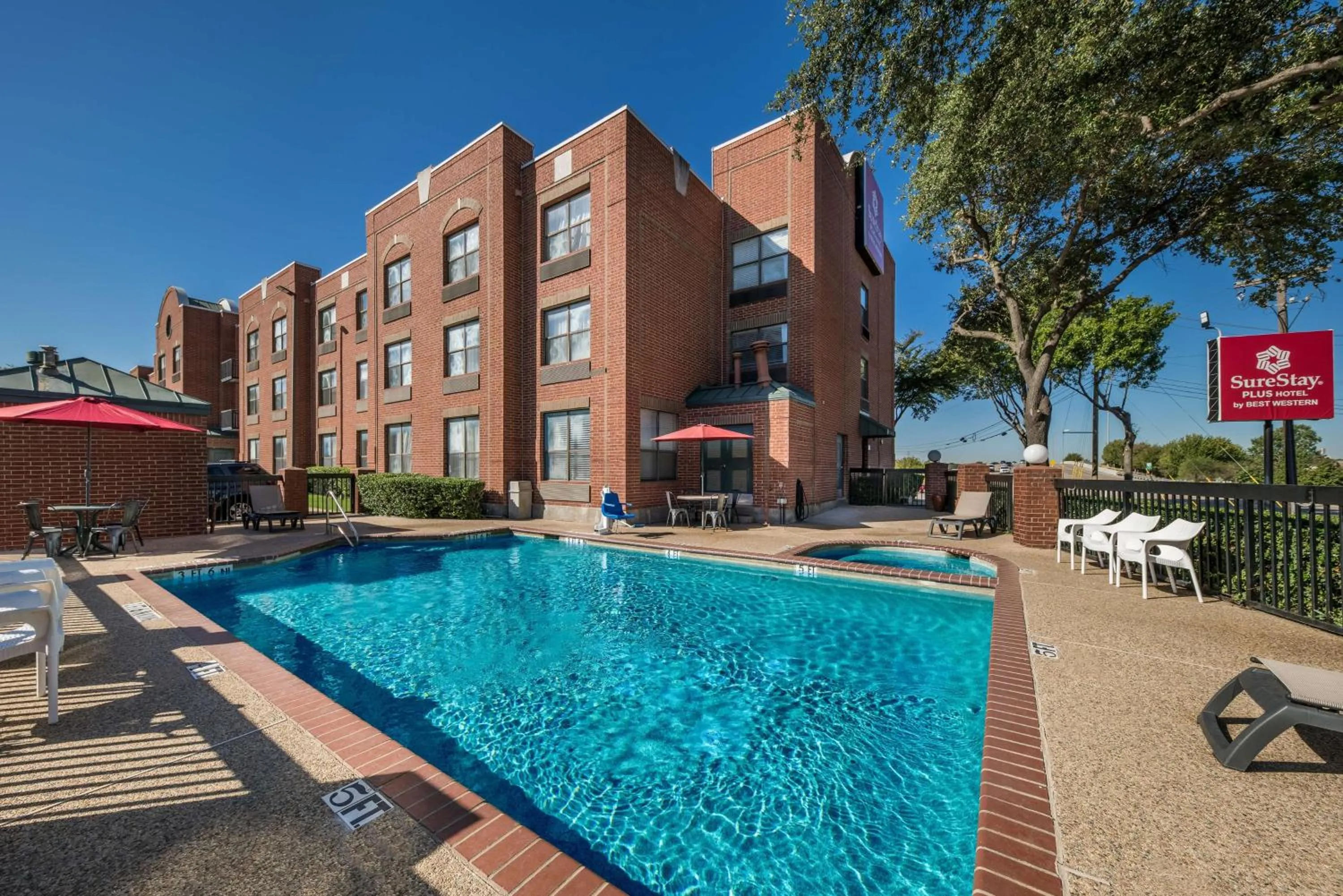 Pool view in SureStay Plus Hotel by Best Western Plano