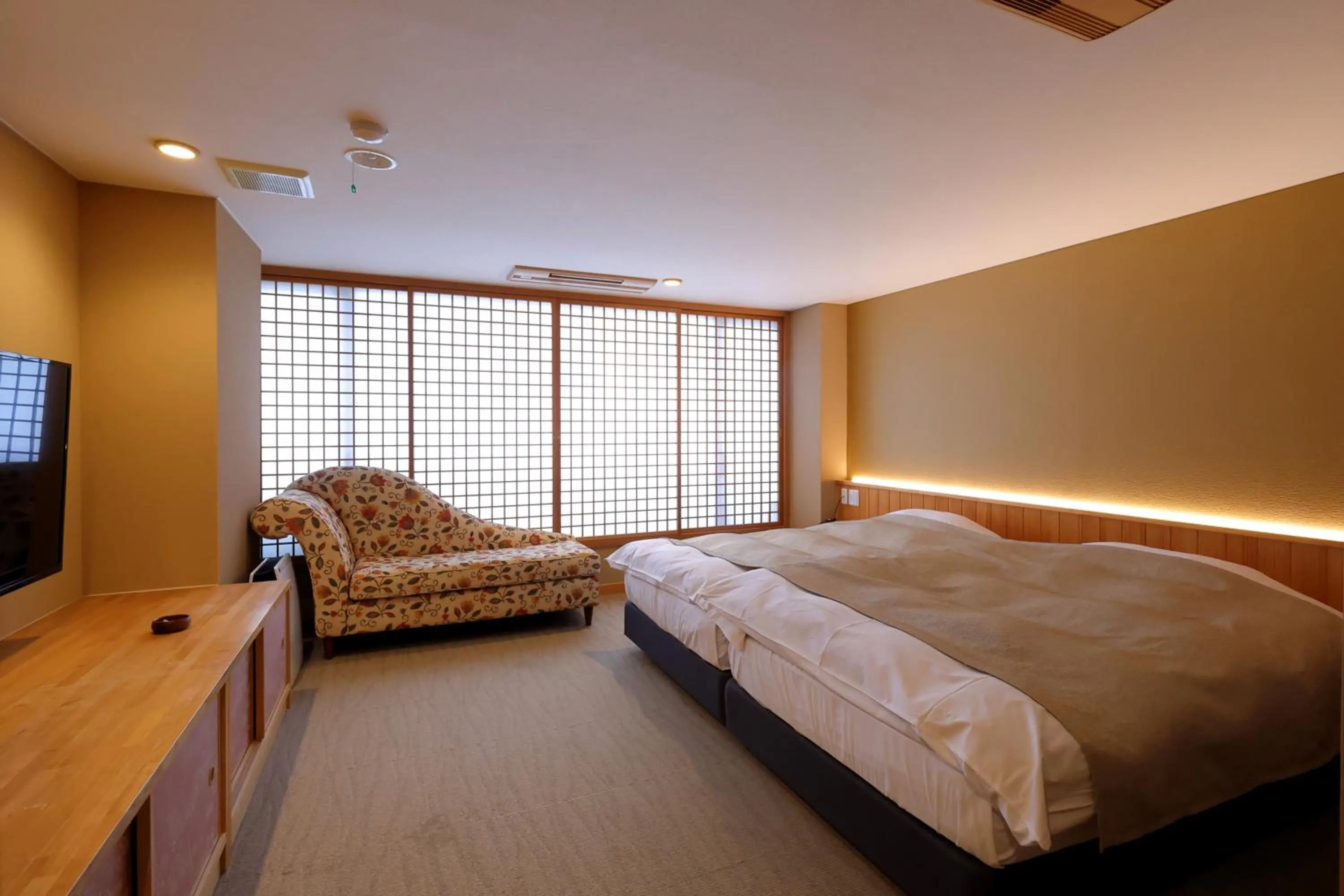 Bedroom, Bed in Kawaguchiya Kinosaki Riverside Hotel