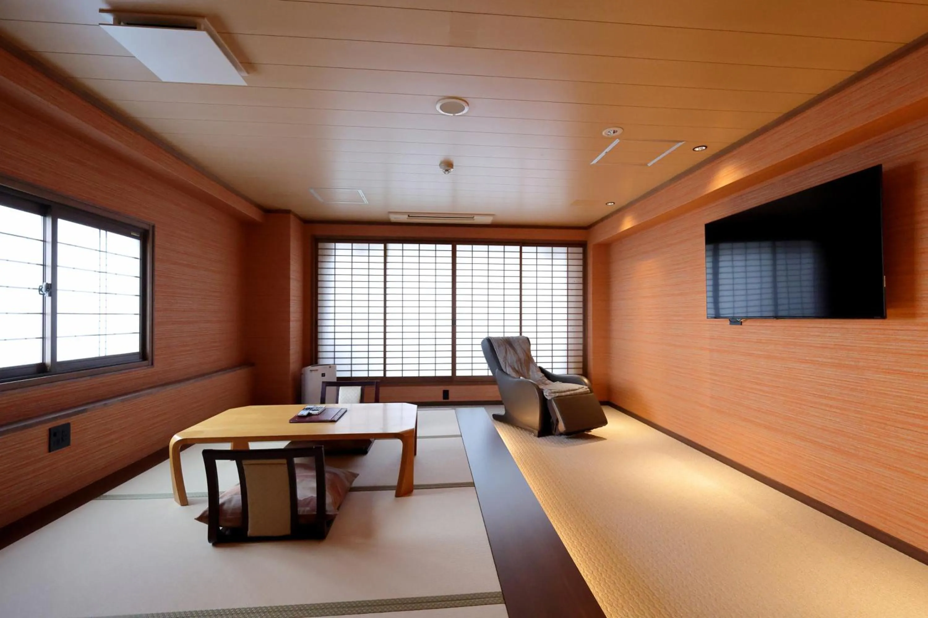 Living room in Kawaguchiya Kinosaki Riverside Hotel