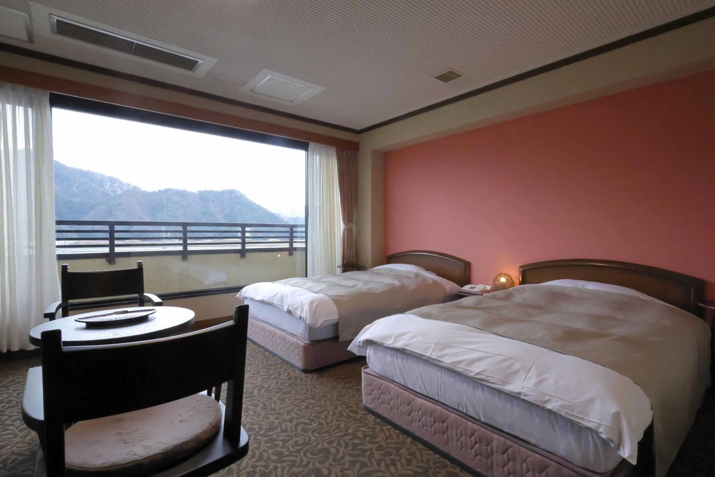 View (from property/room), Bed in Kawaguchiya Kinosaki Riverside Hotel