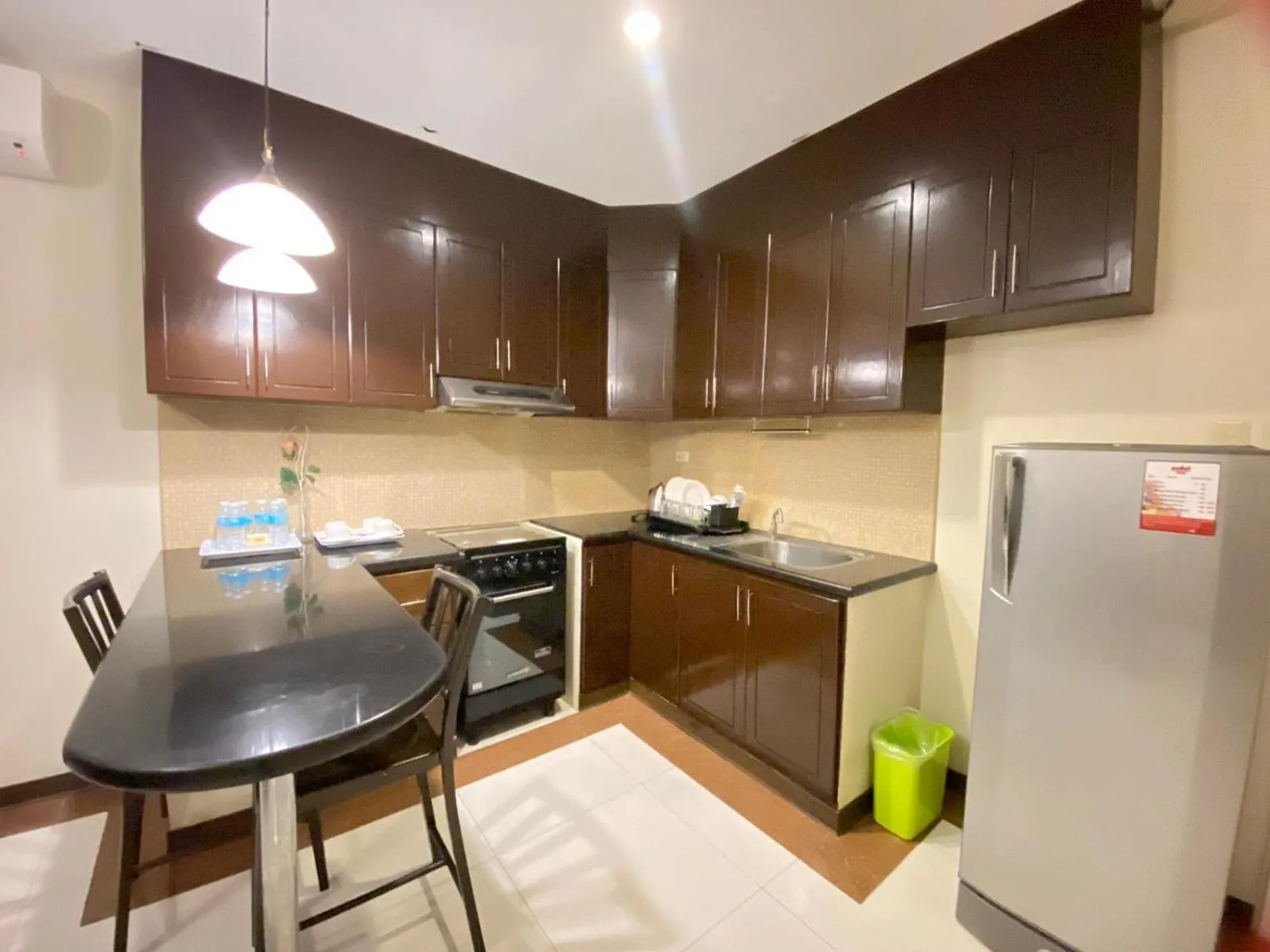 Kitchen or kitchenette in Prism Hotel
