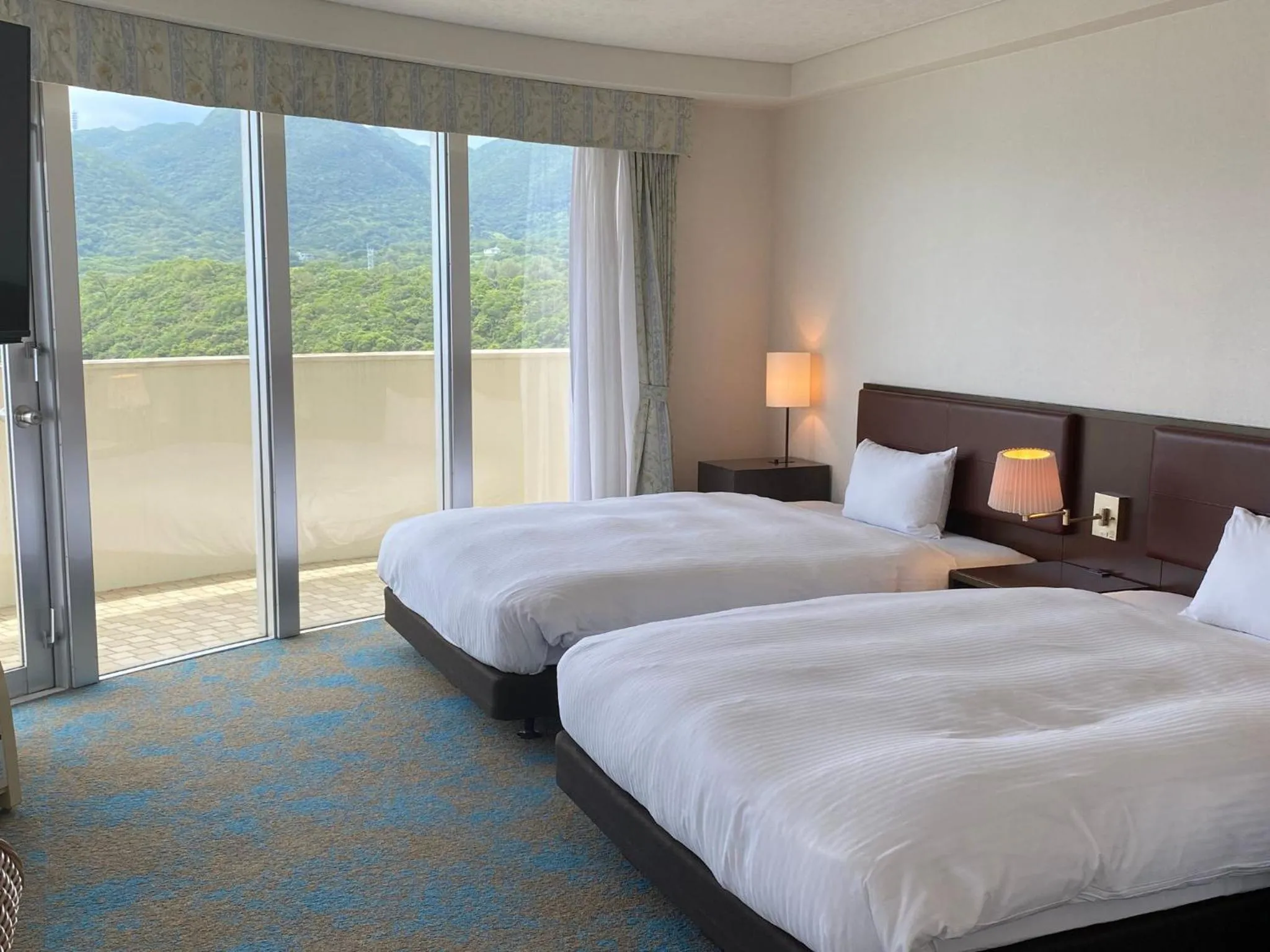 Bed in Hotel Resonex Nago