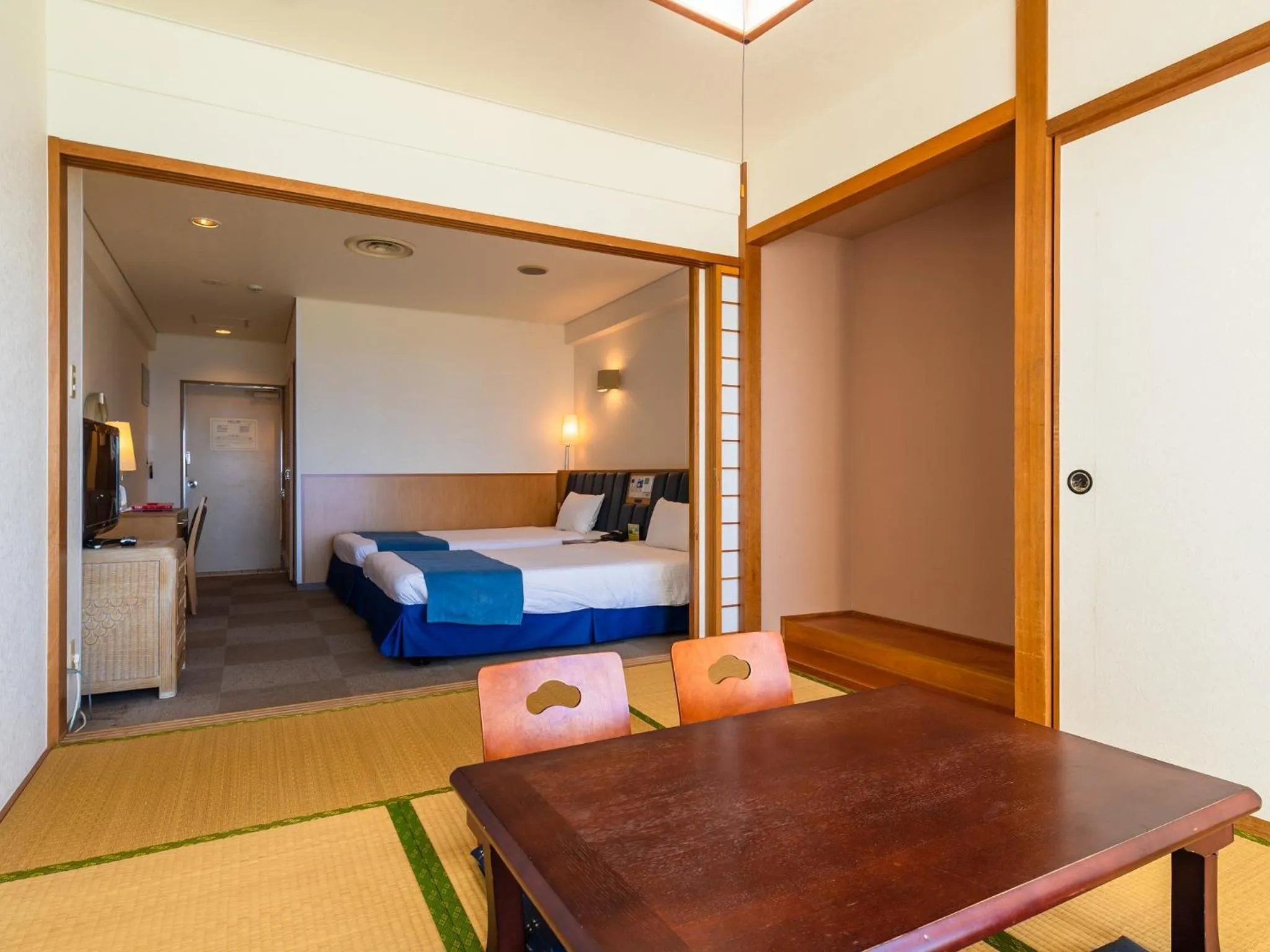 Photo of the whole room, Bed in Hotel Resonex Nago