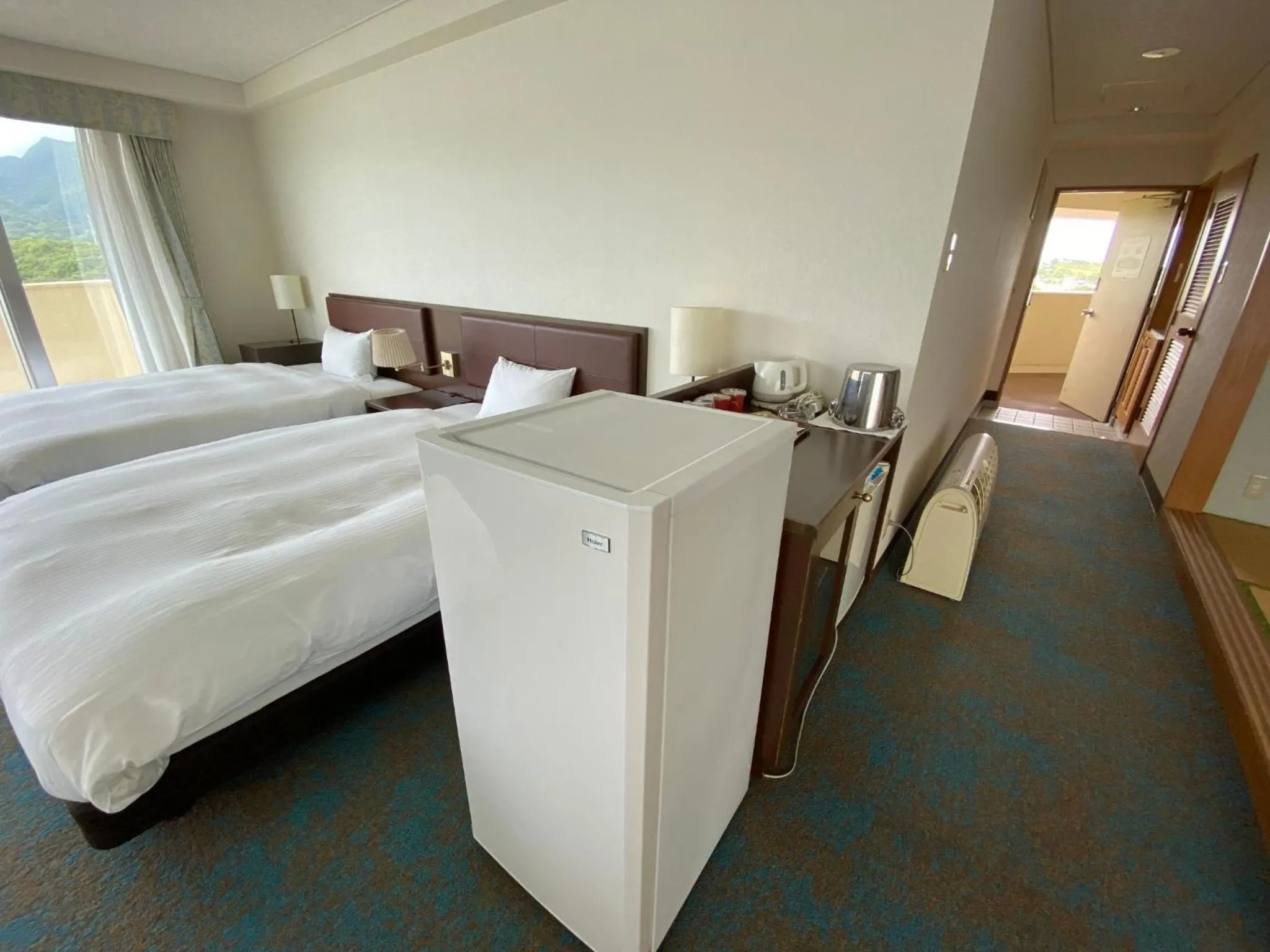 Bed in Hotel Resonex Nago