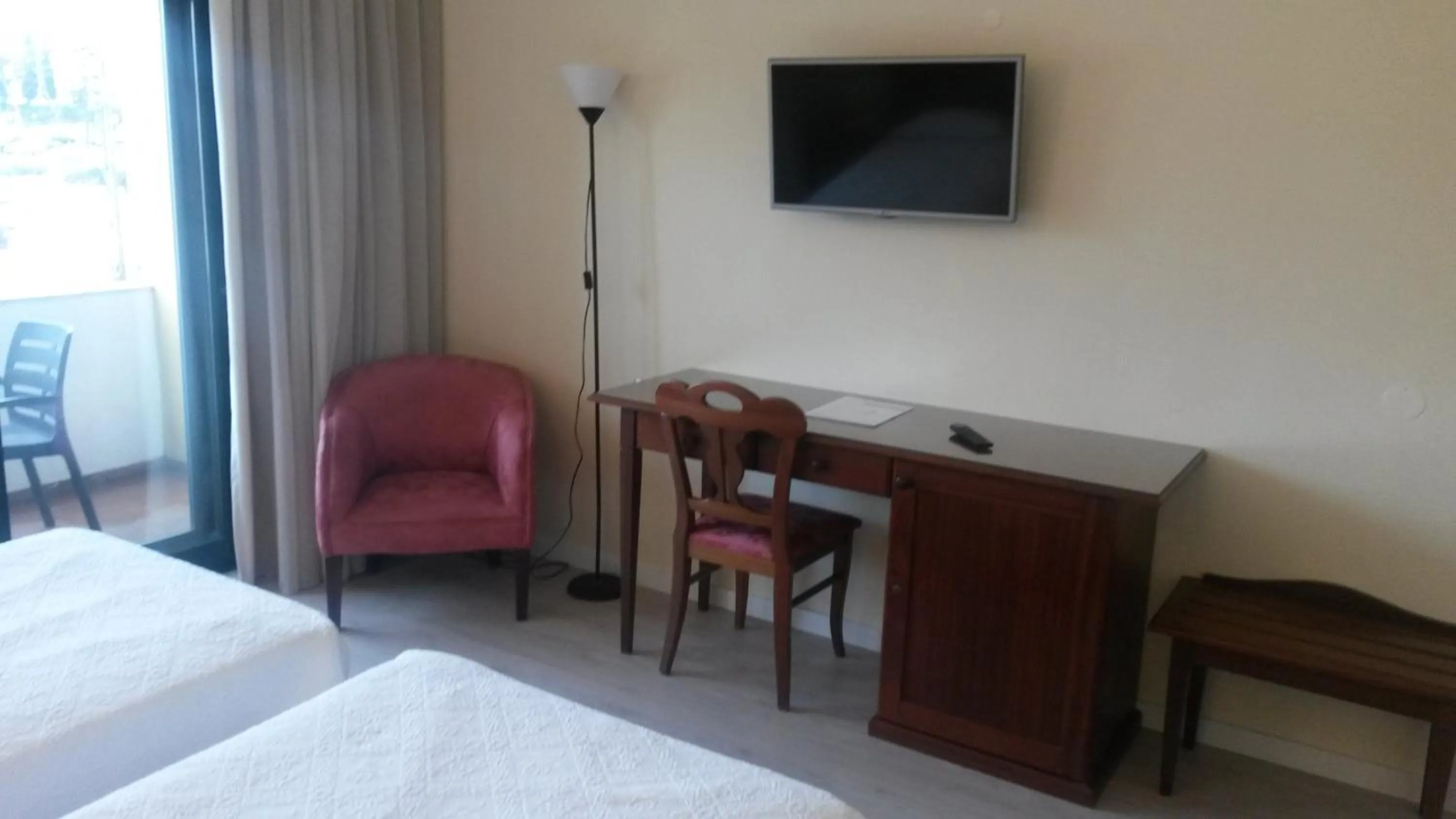 Photo of the whole room, TV/Entertainment Center in Hotel Dom Fernando