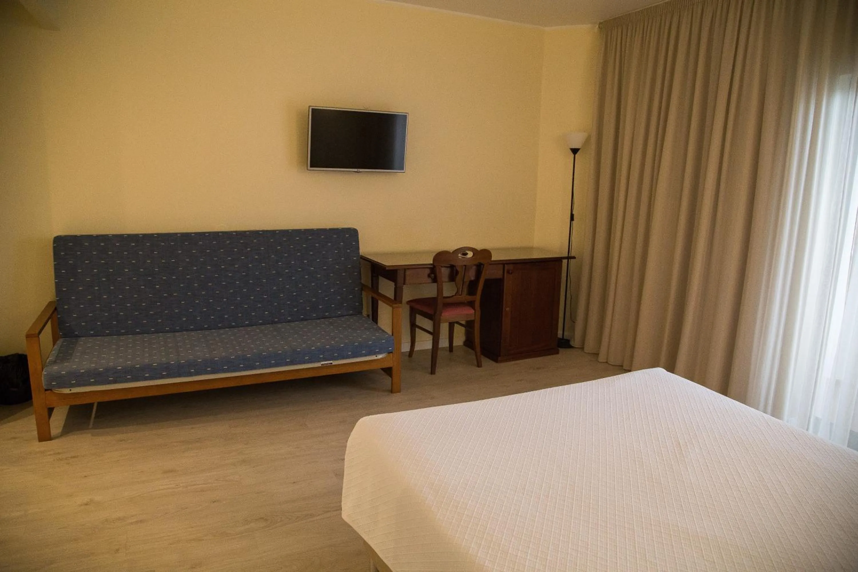 Bed, Seating Area in Hotel Dom Fernando