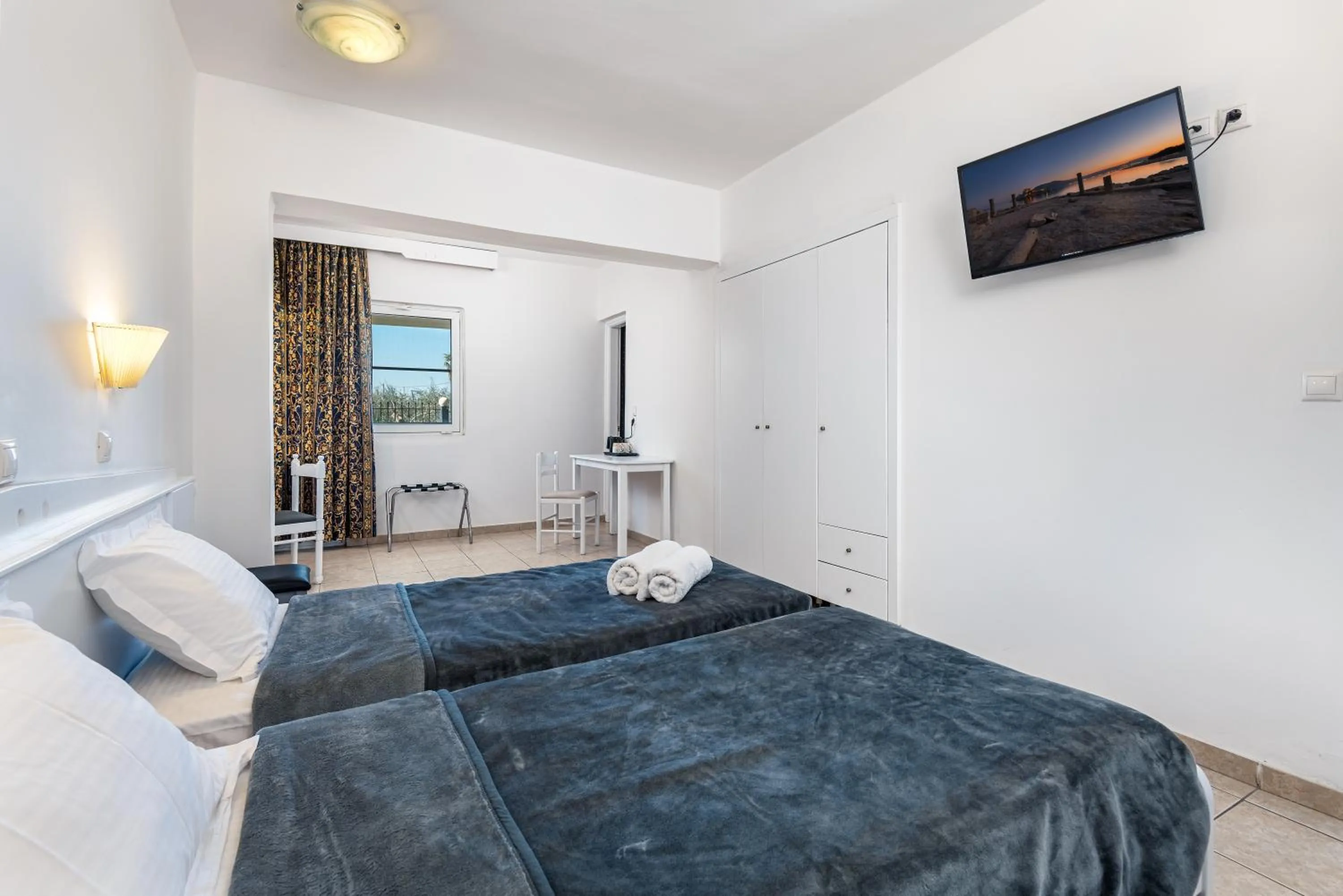 Bed in ILIOS K Village Resort