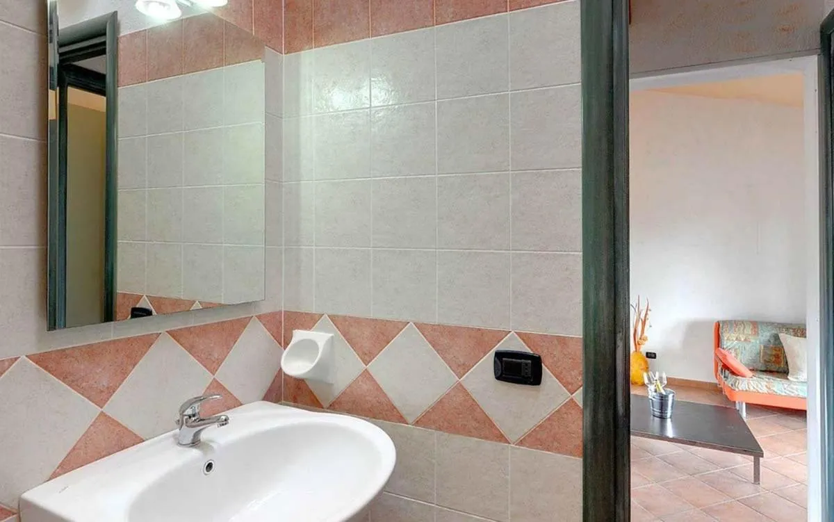 Bathroom in Residence Il Borgo di Porto Corallo